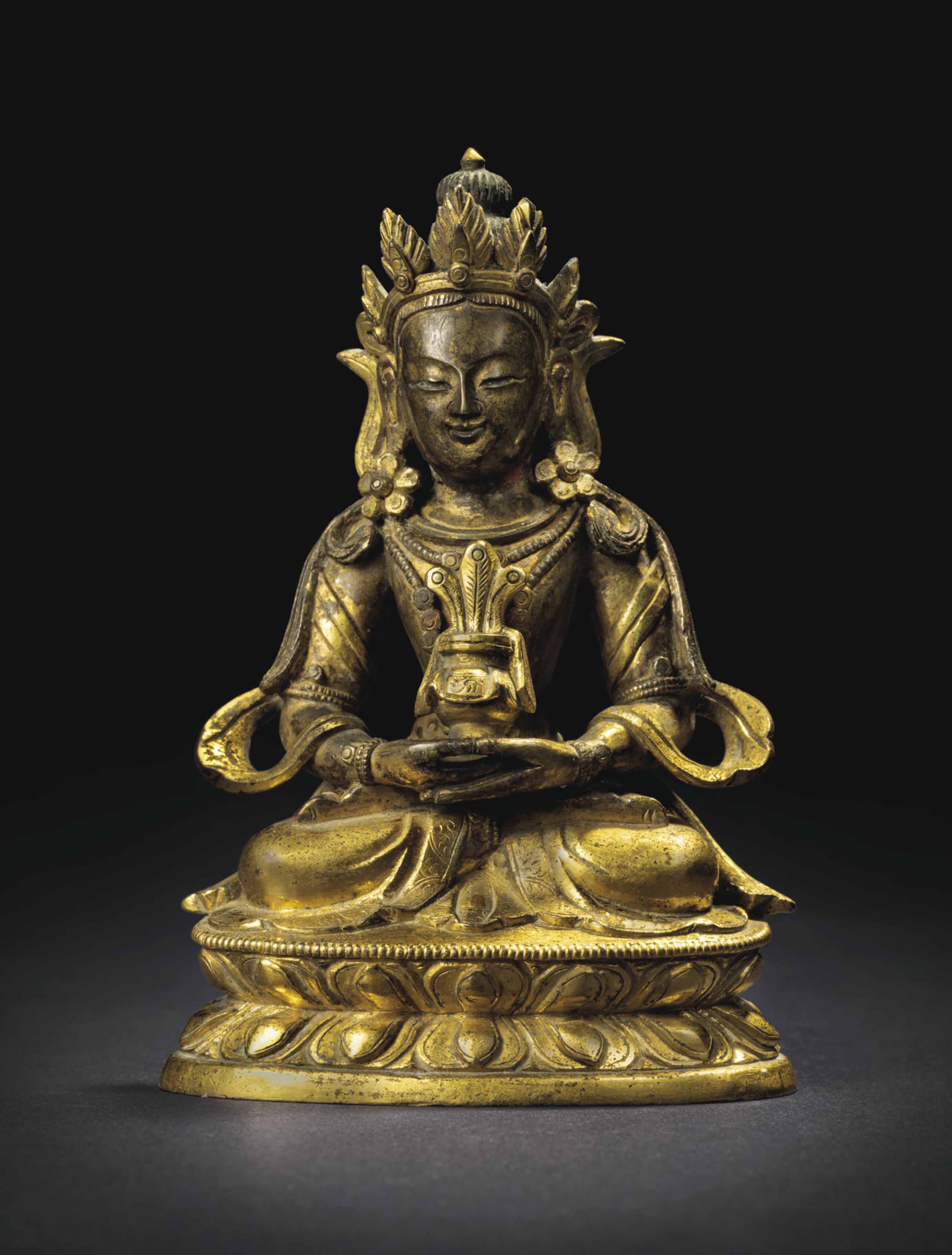 A SMALL GILTBRONZE FIGURE OF AMITAYUS BUDDHA , 18TH CENTURY Christie's