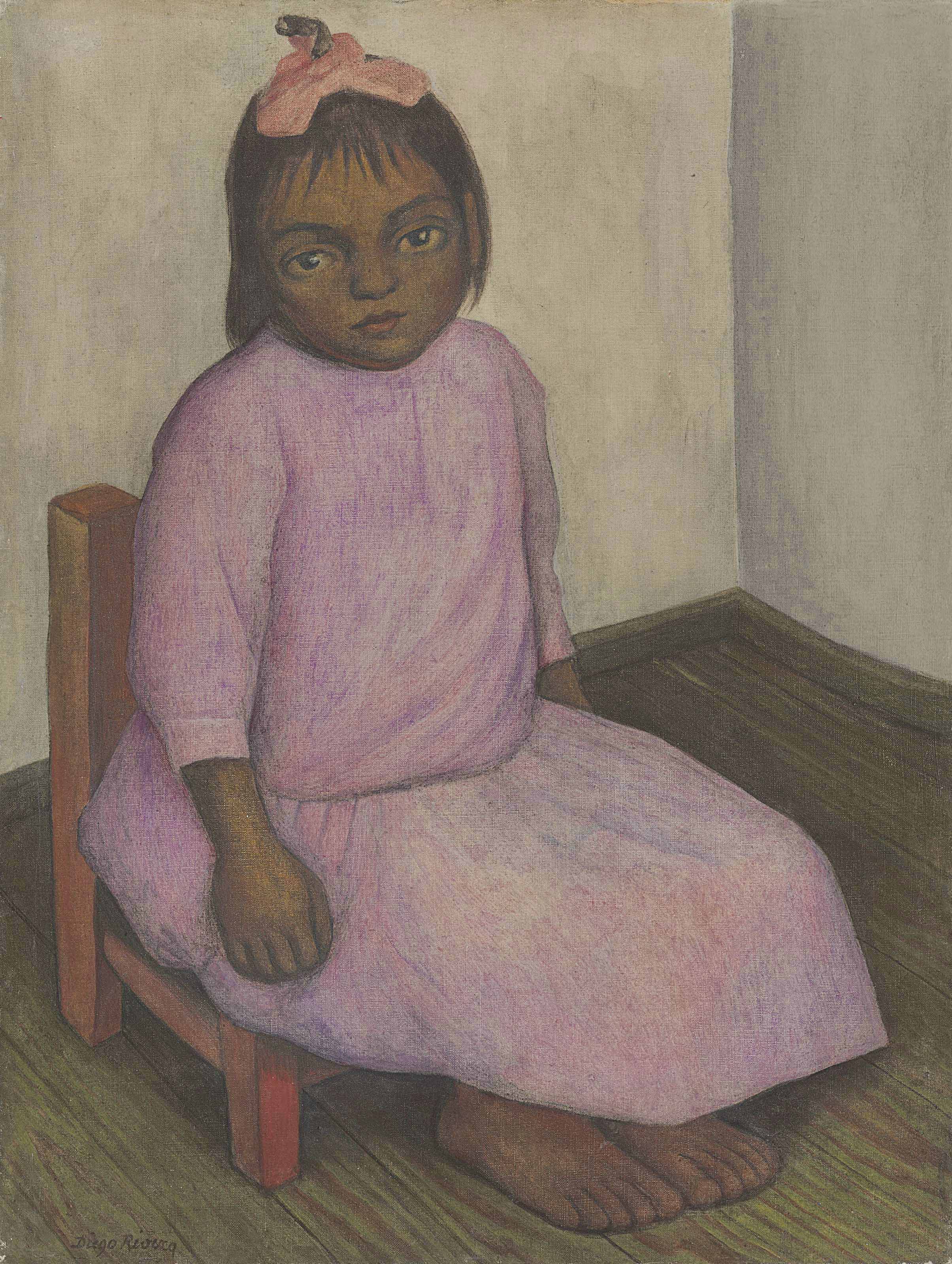 Niña con vestido rosa