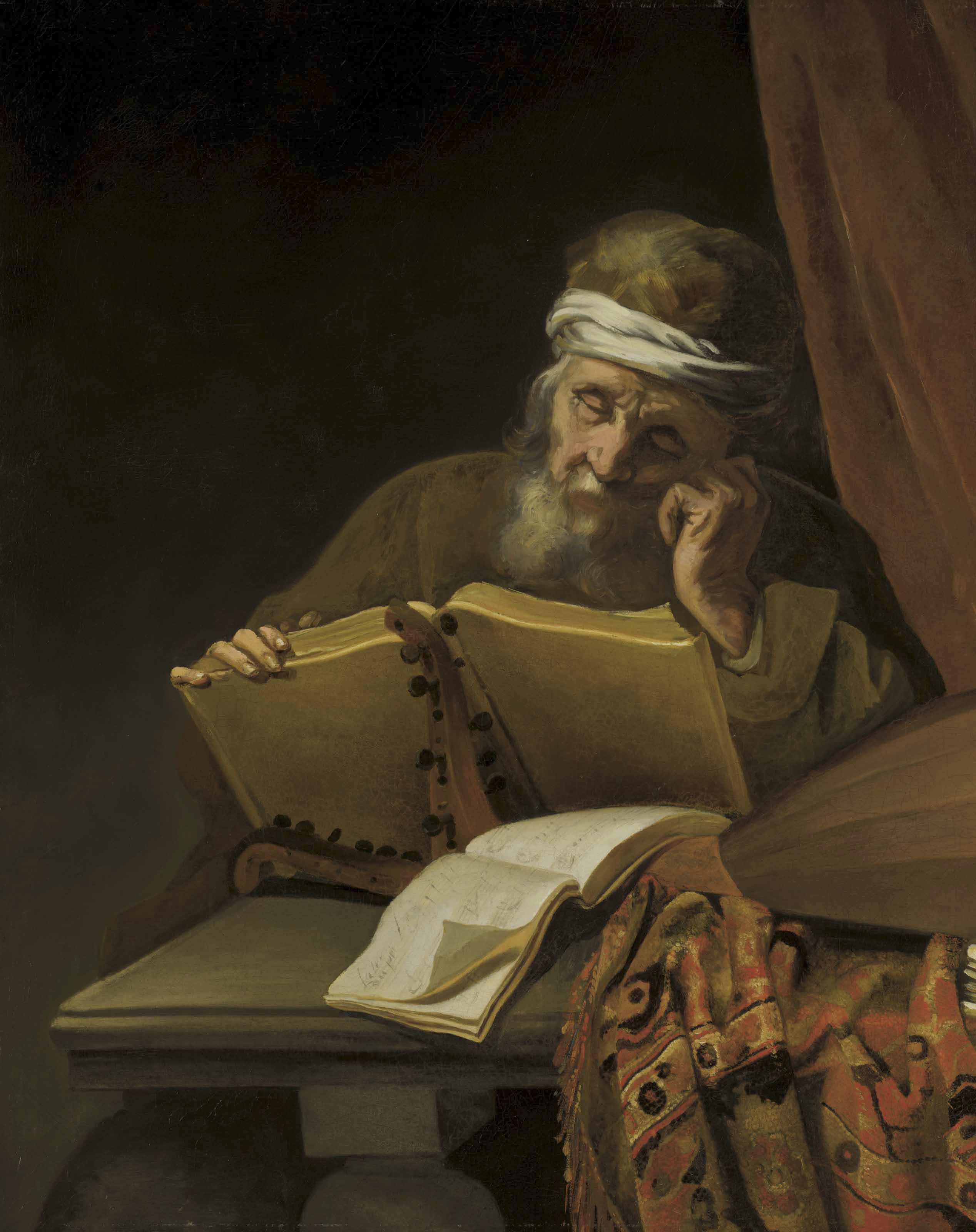 An old man reading at a table with sheets of music, a lute and an oriental carpet, a curtain behind
