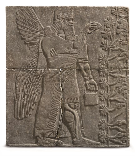 AN ASSYRIAN GYPSUM RELIEF OF A