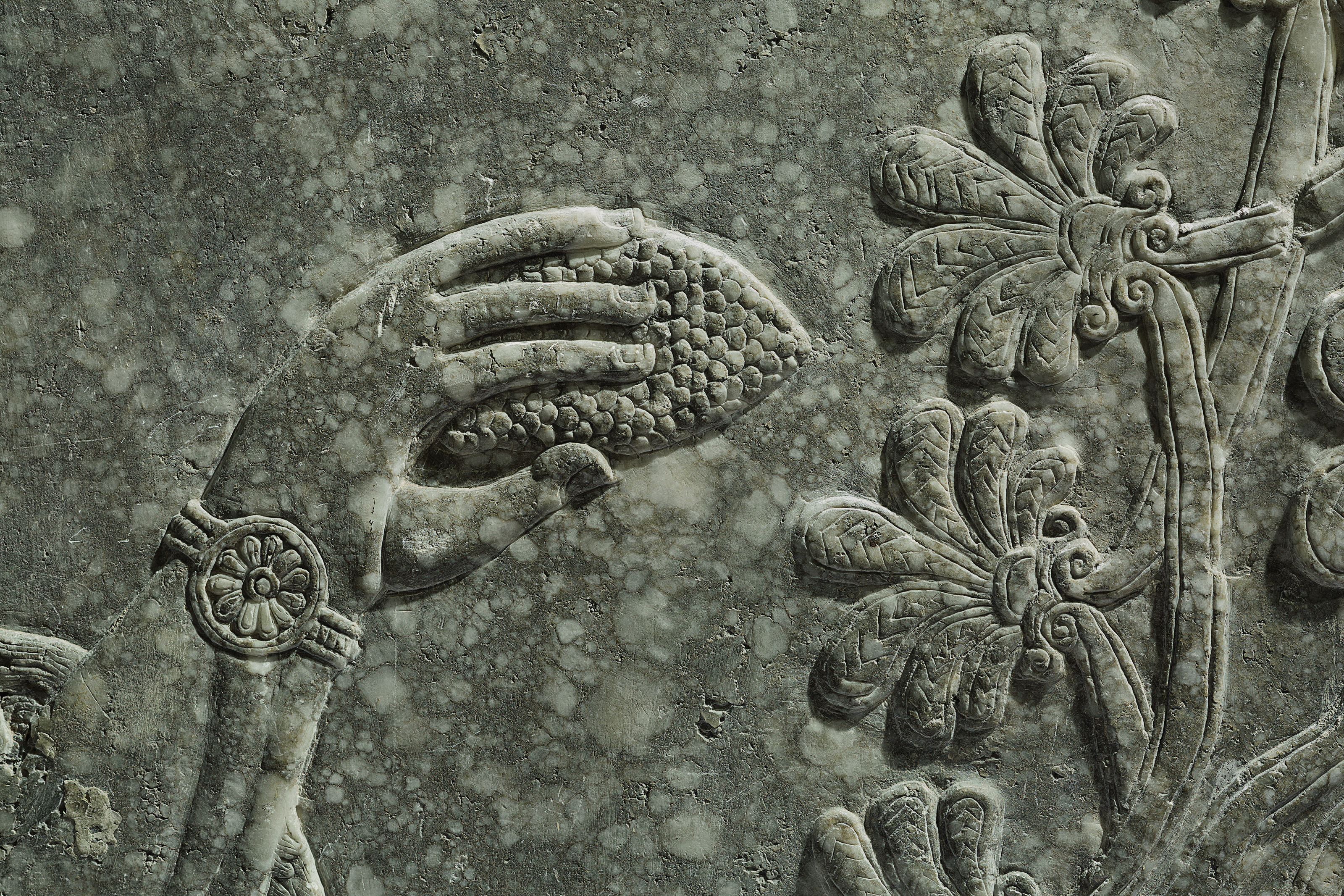 An Assyrian Gypsum Relief Of A Winged Genius Reign Of