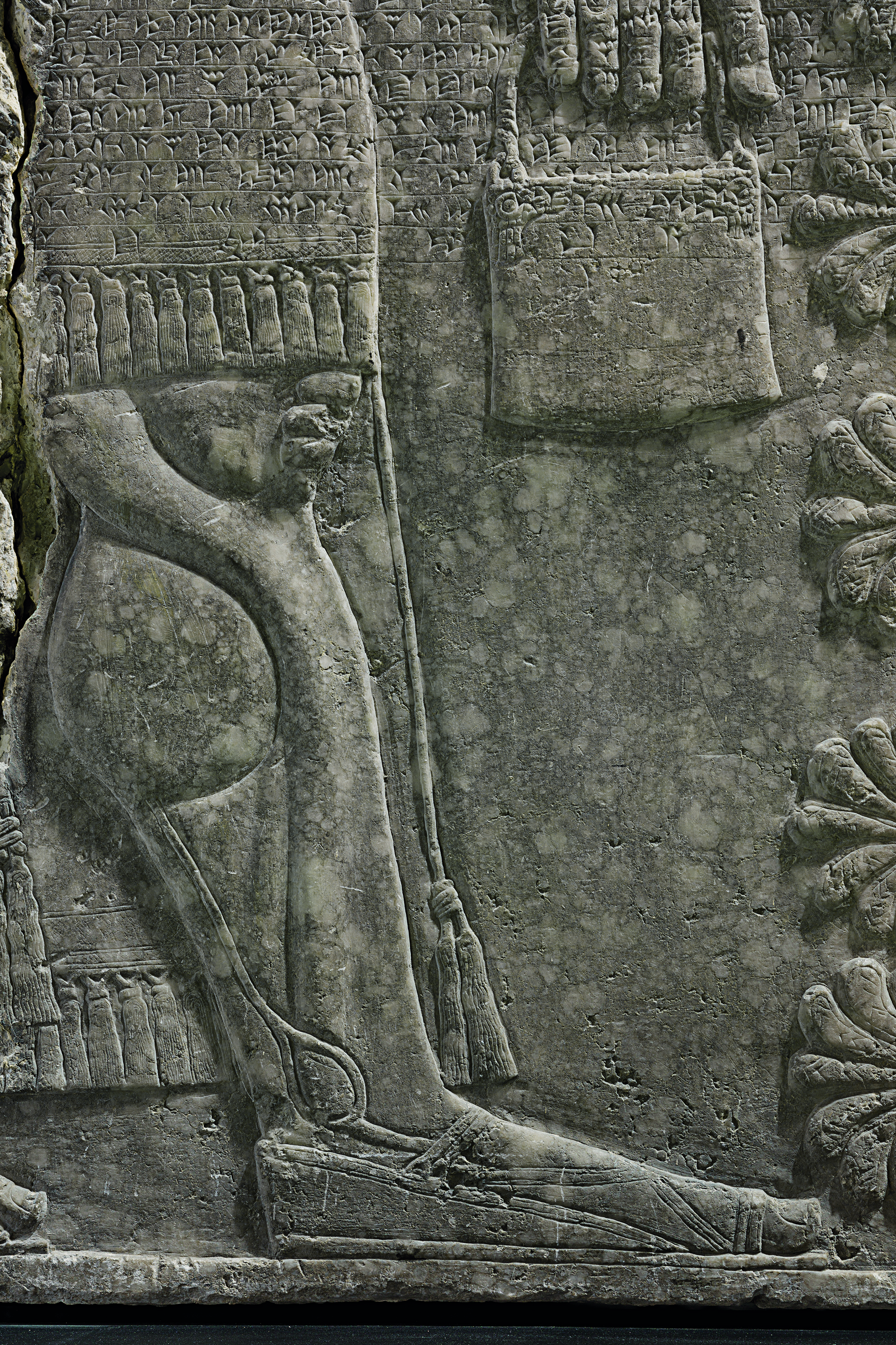 An Assyrian Gypsum Relief Of A Winged Genius Reign Of