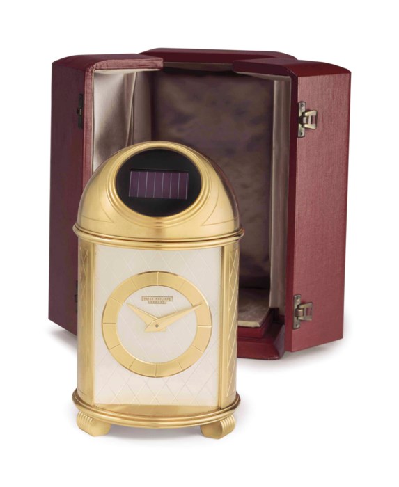 Patek Philippe. A Fine and Very Rare Gilt Brass SolarPowered Dome