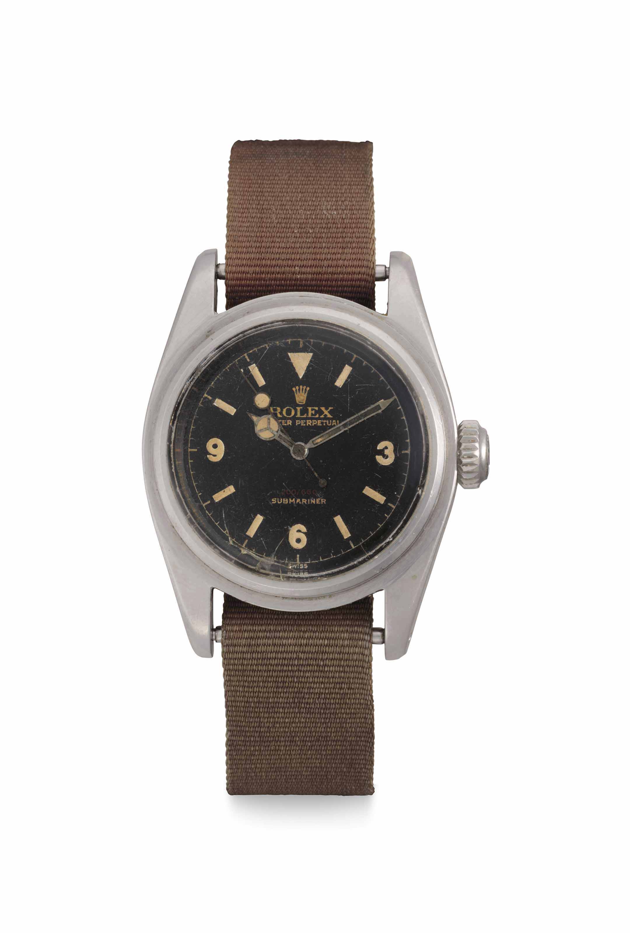 Rolex. A stainless-steel automatic wristwatch with centre seconds and gilt Explorer dial, Signed Rolex, Oyster Perpetual, 200/660, Submariner, ref. 6538, case no. 140'480, circa 1956. 37mm  diameter. Sold for $1,068,500 on 13 June 2018 at Christie&rsquo;s in New York