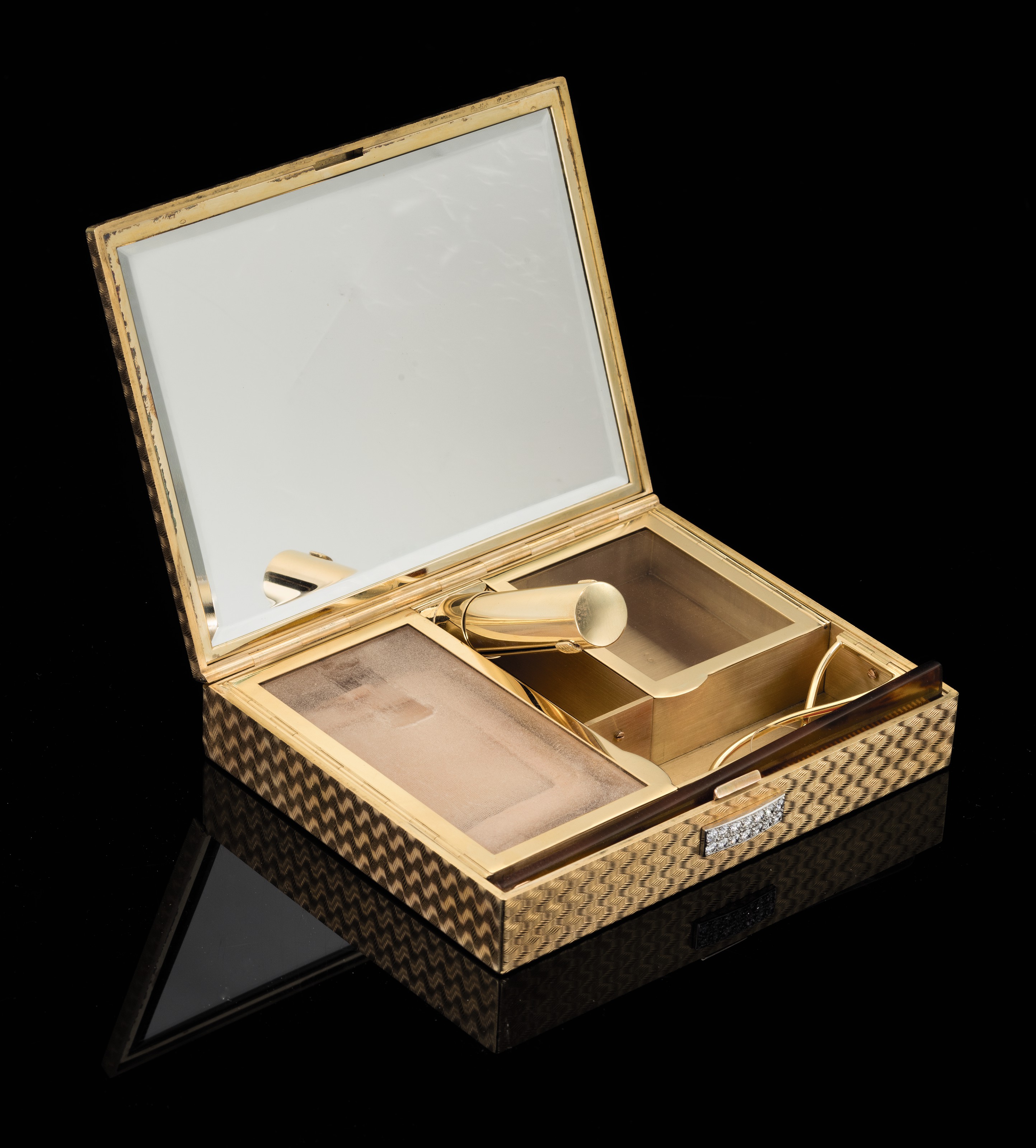 A GOLD AND DIAMOND VANITY CASE , BY CARTIER, CIRCA 1950 Christie's