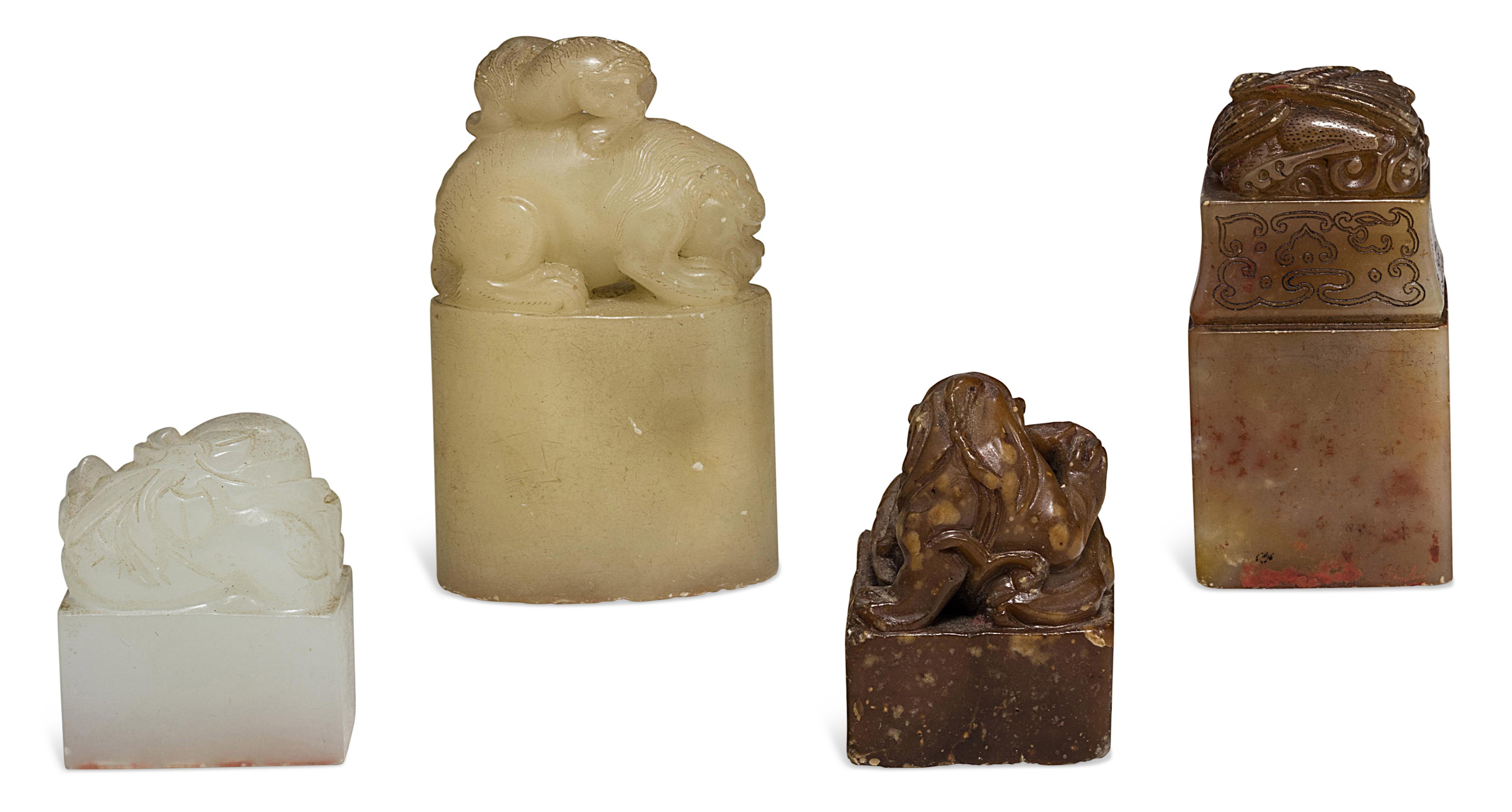 A WHITE JADE SEAL AND THREE SOAPSTONE SEALS, Christie’s