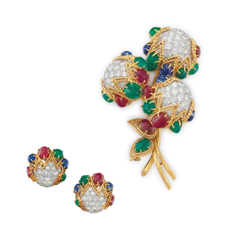 A set of multi-gem and diamond jewellery, by Van Cleef & Arpels. Comprising a brooch, designed as a bouquet of pavé-set diamond flower buds, trimmed with cabochon emeralds, rubies and sapphires and gold wirework detail, to the cabochon ruby and emerald leaves and textured gold stems; and a pair of earrings en suite, 2¾  ins (brooch),⅞  in (earrings), with French export marks,