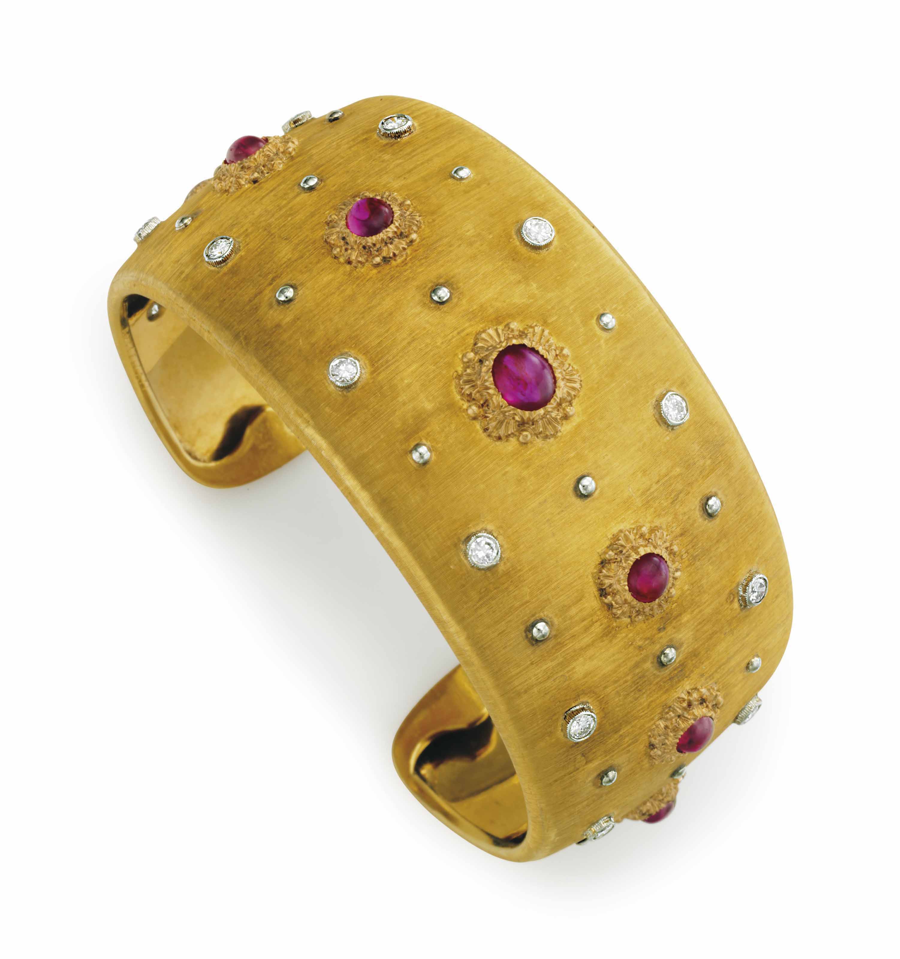 A GOLD, RUBY AND DIAMOND CUFF BRACELET, BY BUCCELLATI Christie's