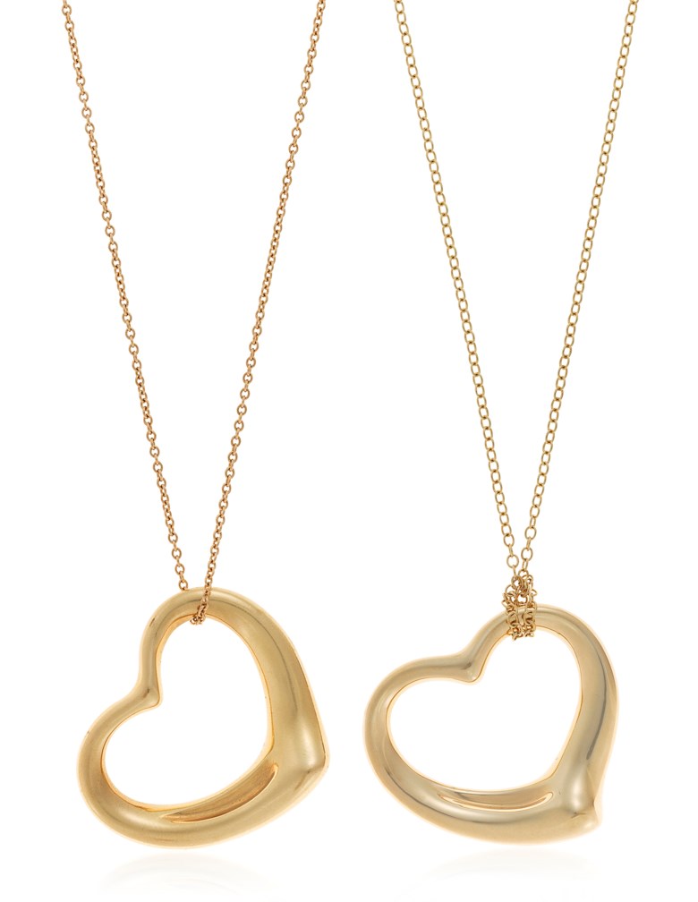 Two Tiffany & Co. Elsa Peretti open heart necklaces. Pendants 2.7 x 2.3 cm and 3.5 x 3.2 cm. Chains 40.5 cm and 72.5 cm. Sold for $1,875 on 4 October 2018 at Christie’s