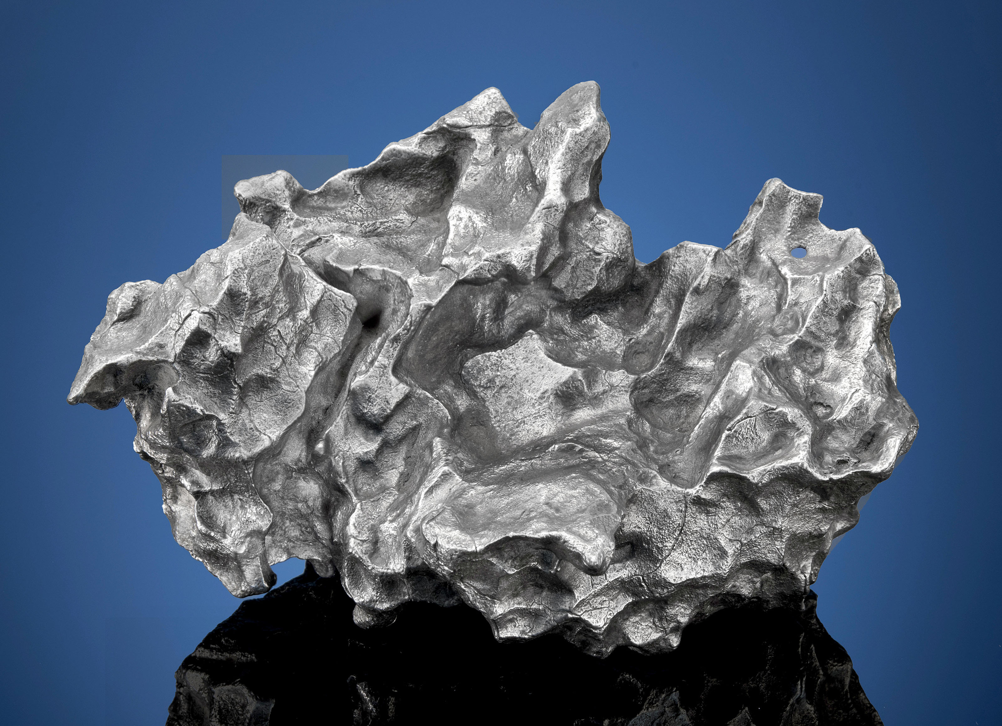 SIKHOTE ALIN METEORITE WITH NATURALLY FORMED HOLE, Iron, coarsest