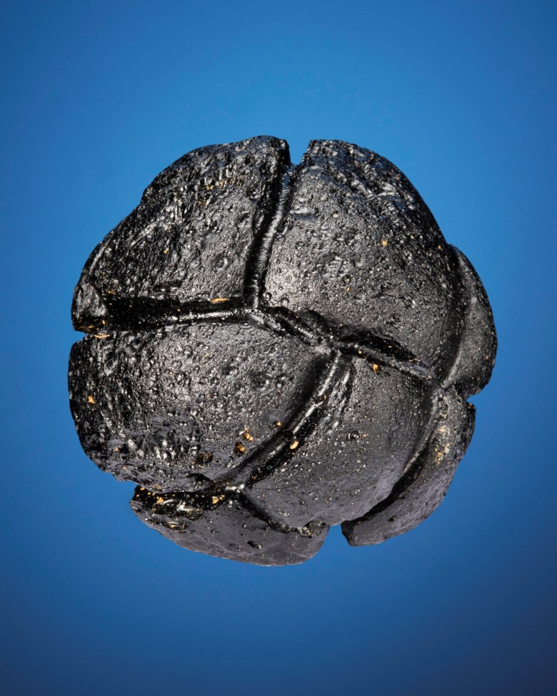 Bikolite Tektites — When Heaven and Earth Collide, Impact Glass Luzon, Philippines. 64 x 64 x 54mm (2½ x 2½ x 2¼in). Estimate $800-1,200. This lot is offered in Deep Impact Martian, Lunar and Other Rare Meteorites, 7-14 February 2018, Online