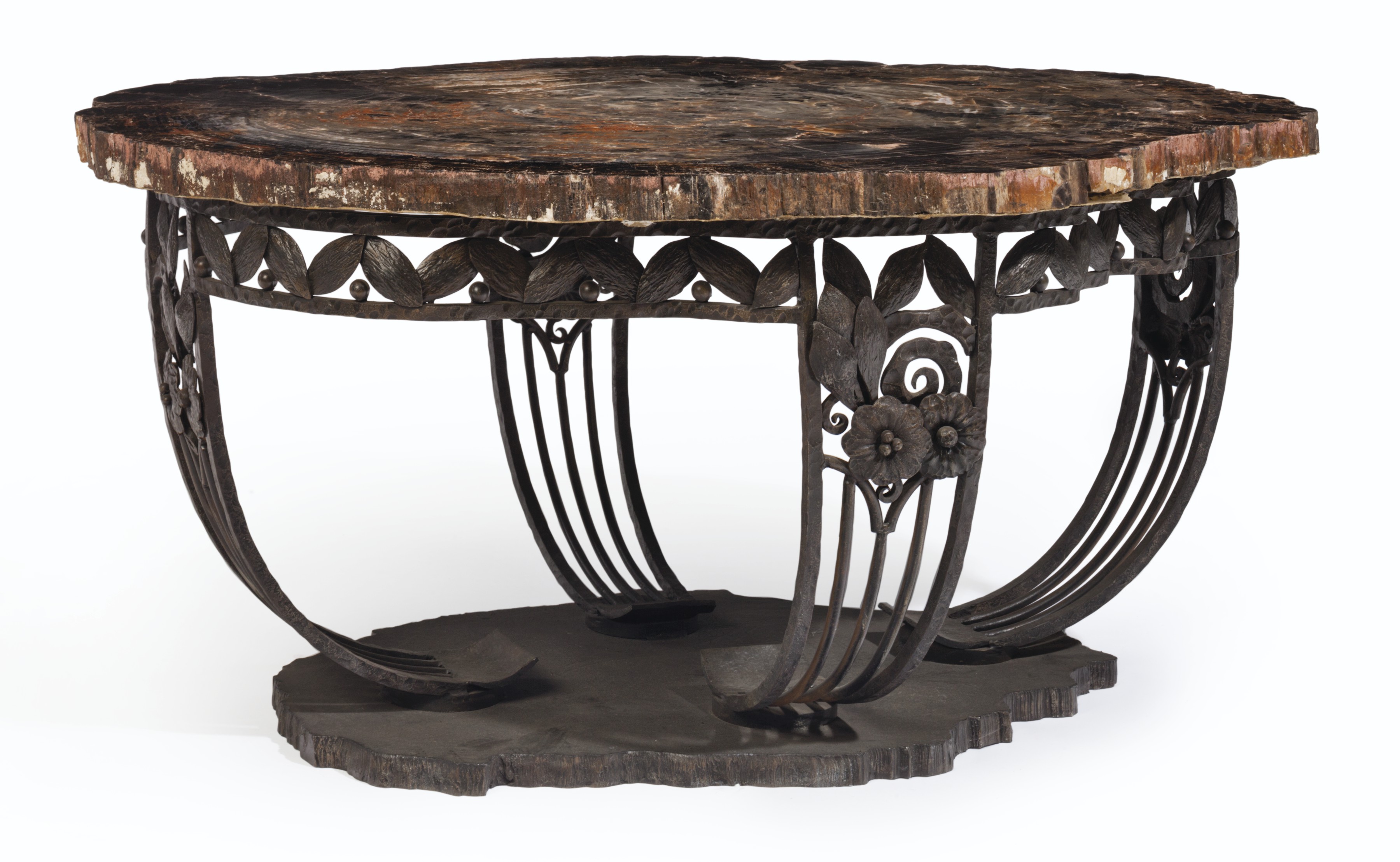 A Wrought Iron And Petrified Wood Coffee Table 20th Century Christie S