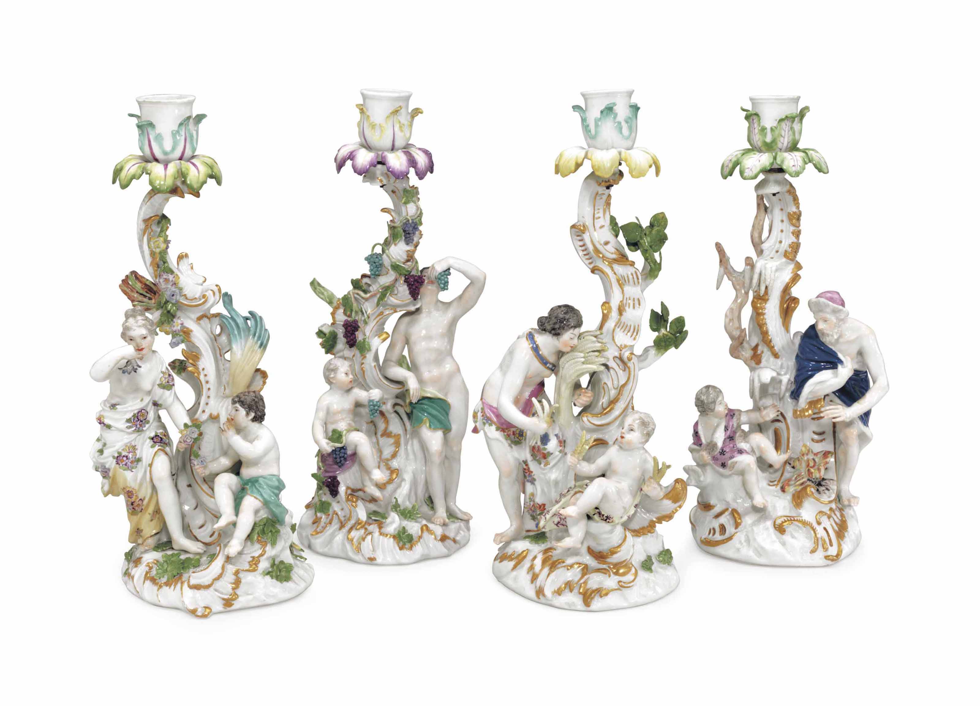 A SET OF FOUR MEISSEN PORCELAIN FIGURAL CANDLESTICKS EMBLEMATIC OF THE