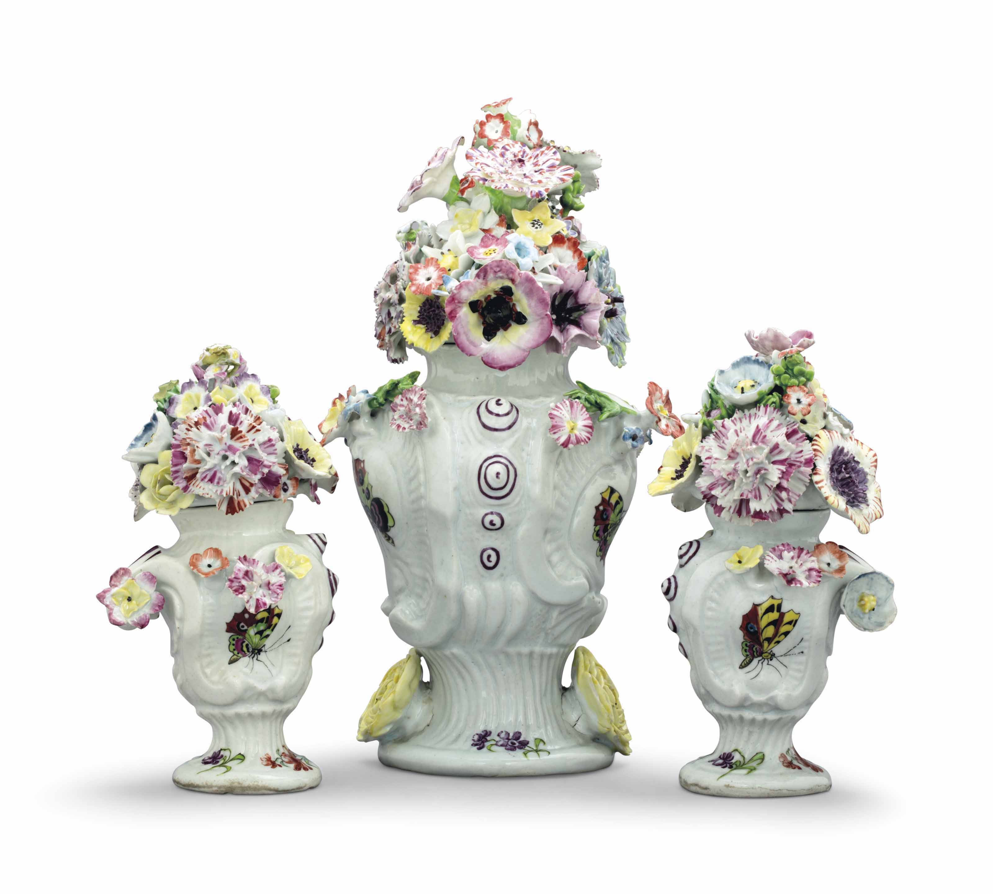 A LONGTON HALL PORCELAIN THREEVASE GARNITURE , CIRCA 1755 Christie's