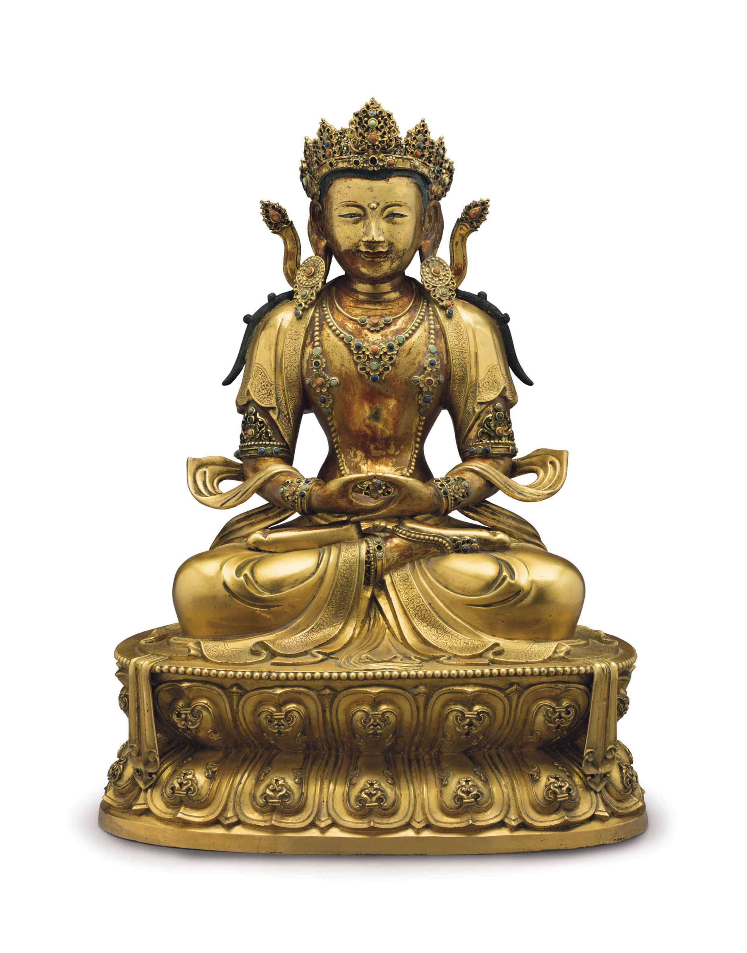 An Imperial gilt-bronze figure of Amitayus, China, Kangxi Period (1662-1722). 16 &frac12;  in (41.9  cm) high. Estimate: $400,000-600,000. This lot is offered in The Collection of David and Peggy Rockefeller: Travel &amp; Americana on 10 May at Christie&rsquo;s in New York