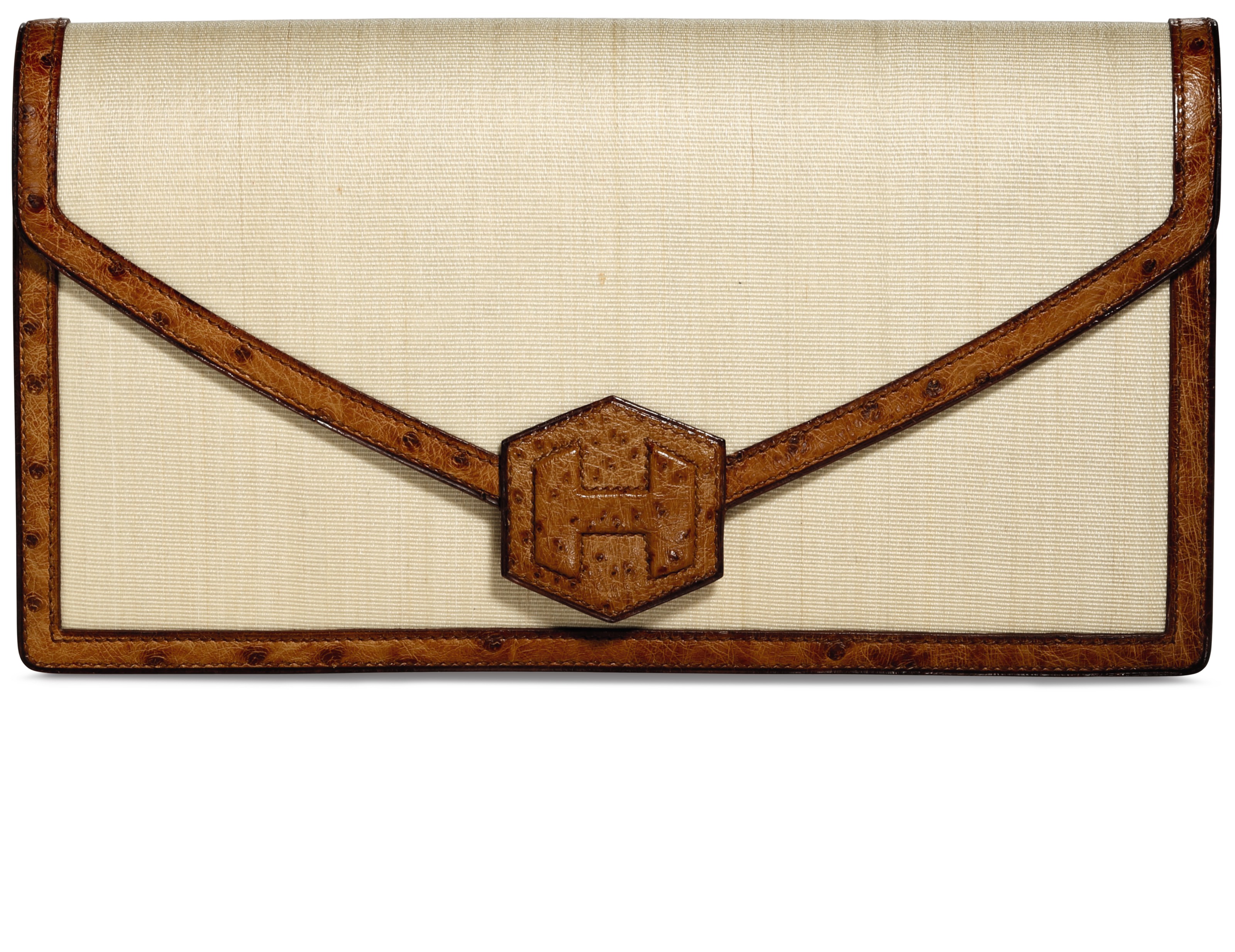 A cognac ostrich &amp; crinoline Hexagone clutch, Herm&egrave;s, 1978. Width 20 cm, height 15 cm, depth 3 cm. Estimate: $1,000-1,500. Offered in What Goes Around Comes Around 25th Anniversary Auction on 18 September 2018 at Christie&rsquo;s in New York
