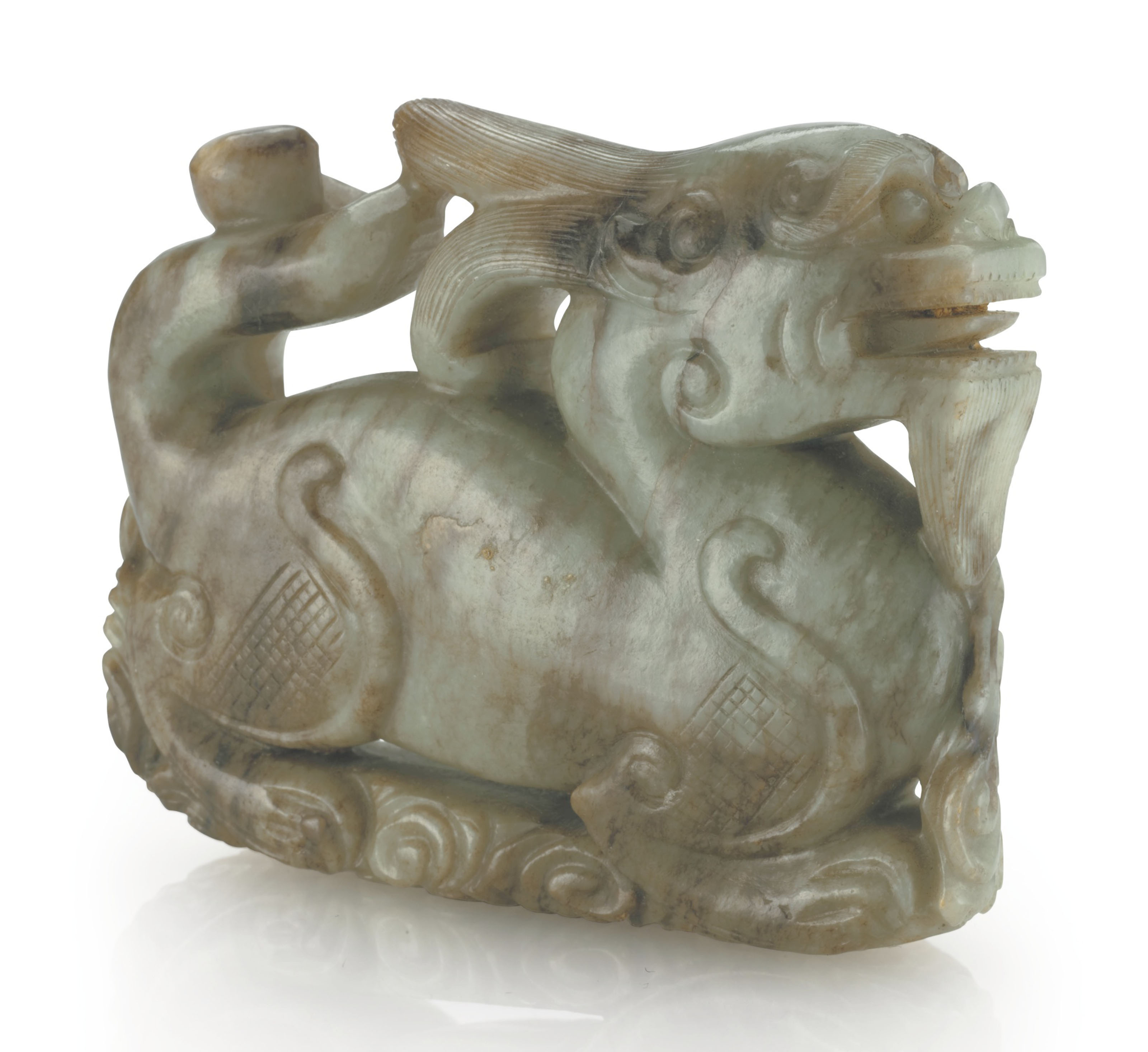 A MOTTLED PALE GREYISH-WHITE AND BROWN JADE FIGURE OF A RABBIT, MING ...