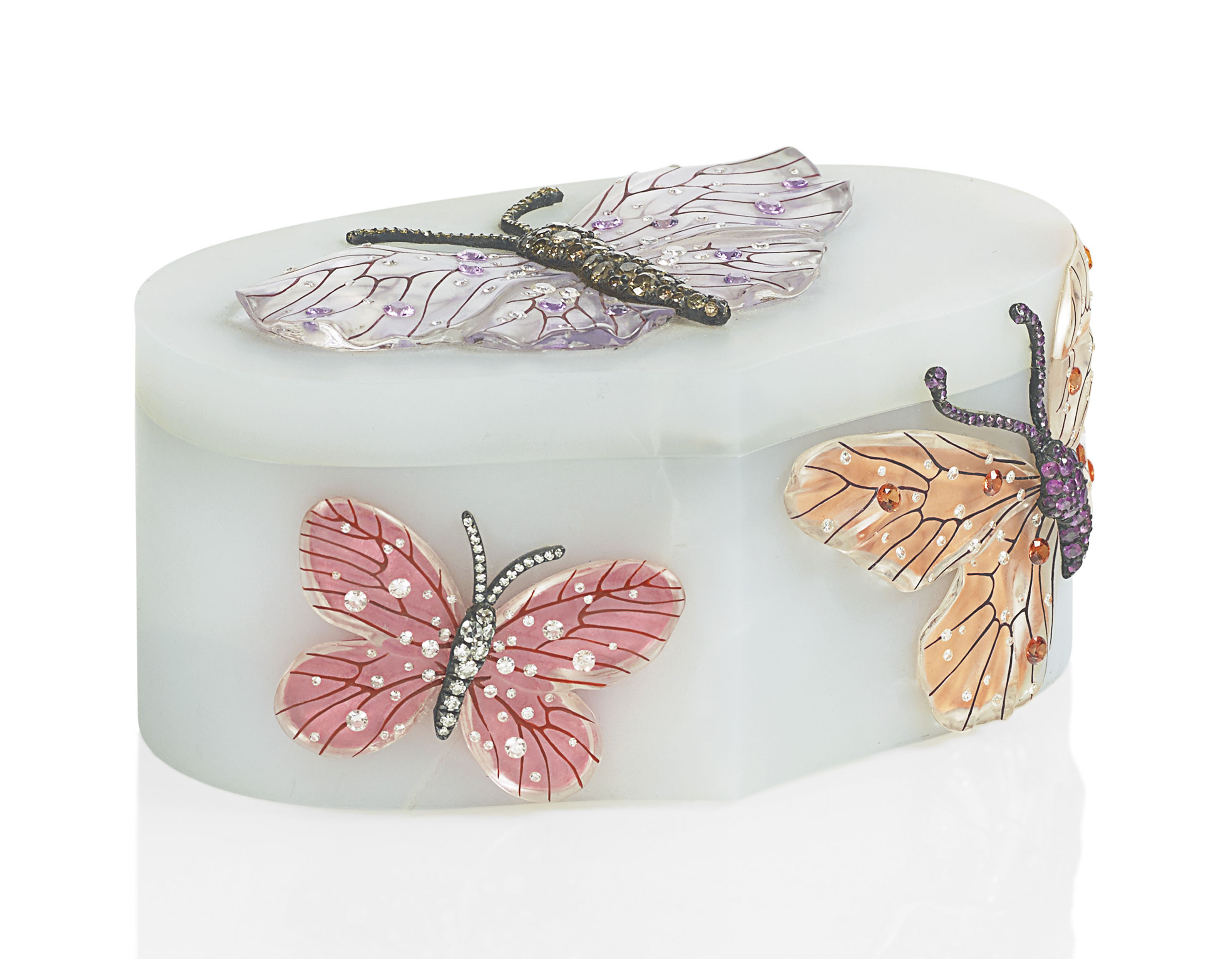 Calcedoine box, rock crystal, coloured sapphires, coloured diamonds and diamonds, by JAR. Height: 4.2  cm (1.6  in); length: 9.5  cm (3.7  in); width: 5.8  cm (2.2  in). Estimate: &euro;80,000-120,000. Offered in The Collection of Juan de Beistegui&nbsp;on 10 September at Christie&rsquo;s in Paris