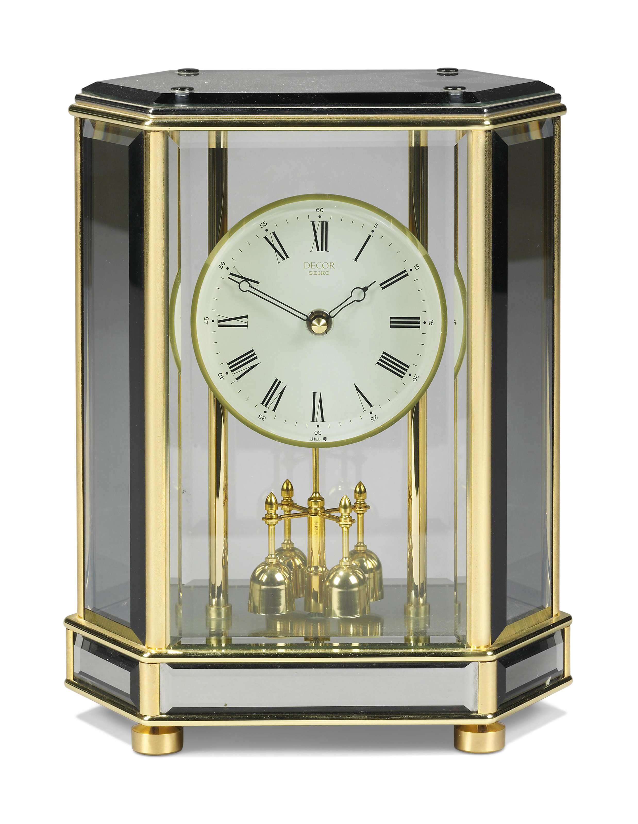A GILT-METAL TABLE CLOCK, DECOR BY SEIKO, LATE 20TH CENTURY | Christie’s