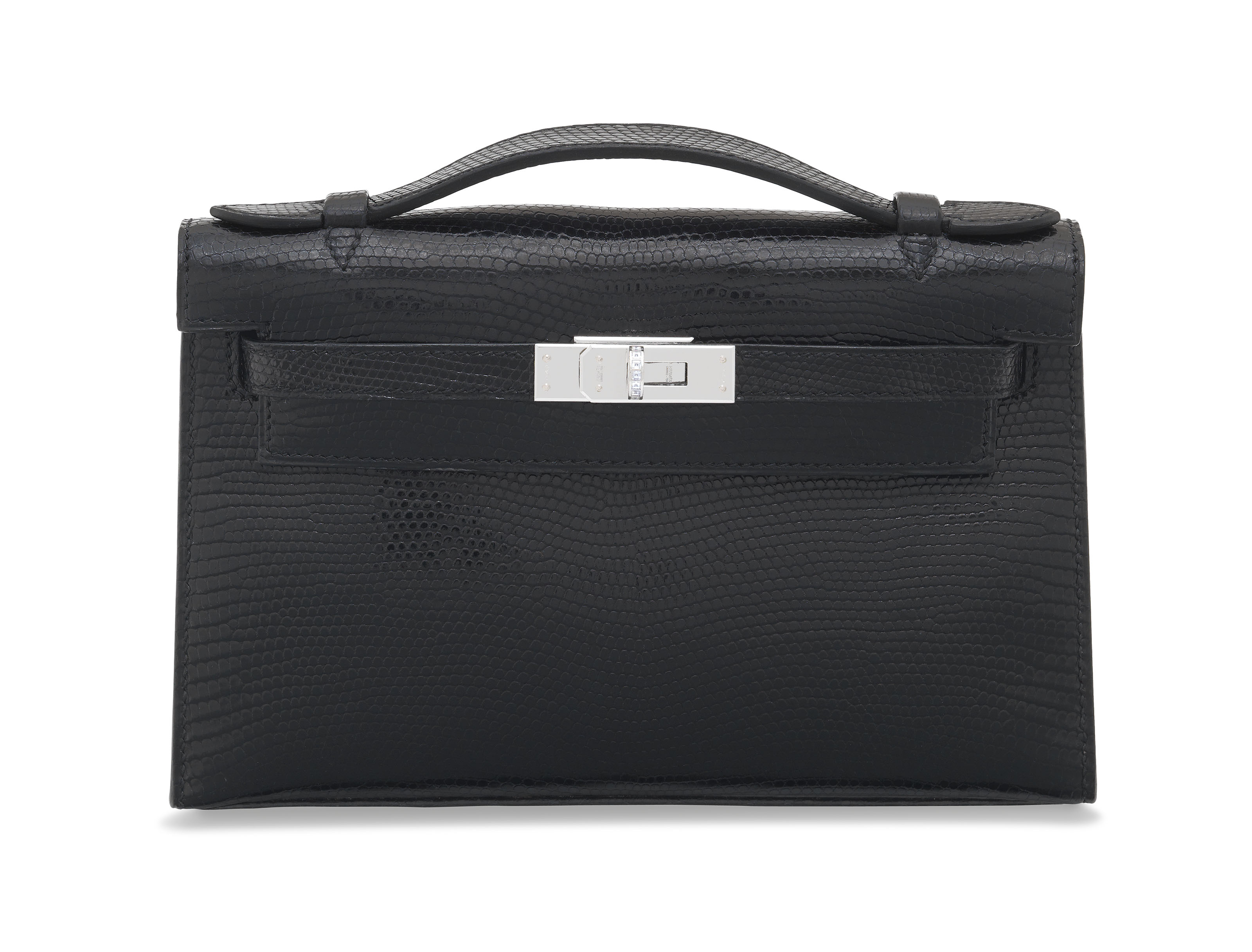 An exceptional Shiny Black Niloticus Lizard Kelly Pochette with 18k white gold and diamond hardware. Herm&egrave;s, 2006. Sold for &pound;32,500 on 11 June 2019 at Christie&rsquo;s in London