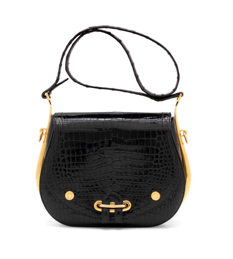A shiny black porosus crocodile Passe-Guide with gold hardware, Hermès, 1982. 21 w x 18 h x 8 d cm. Sold for £9,375 on 11 June 2019 at Christie’s in London