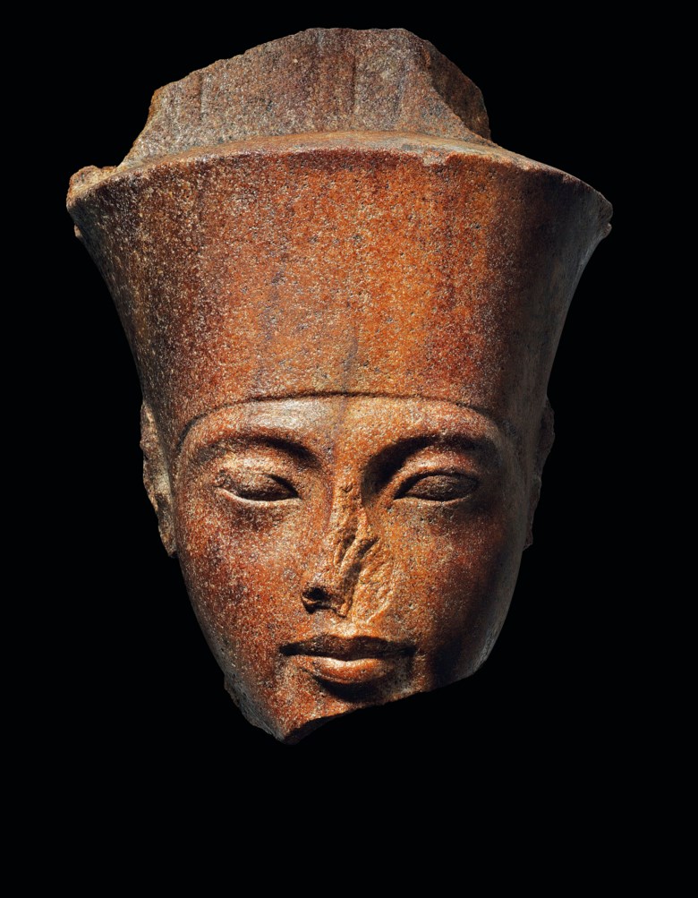 An Egyptian brown quartzite head of the god Amen with the features of the Pharaoh Tutankhamen, New Kingdom, 18th dynasty, reign of Tutankhamen, circa 1333-1323 BC. 11¼  in (28.5  cm) high. Sold for £4,746,250 in The Exceptional Sale on 4 July 2019 at Christie’s in London