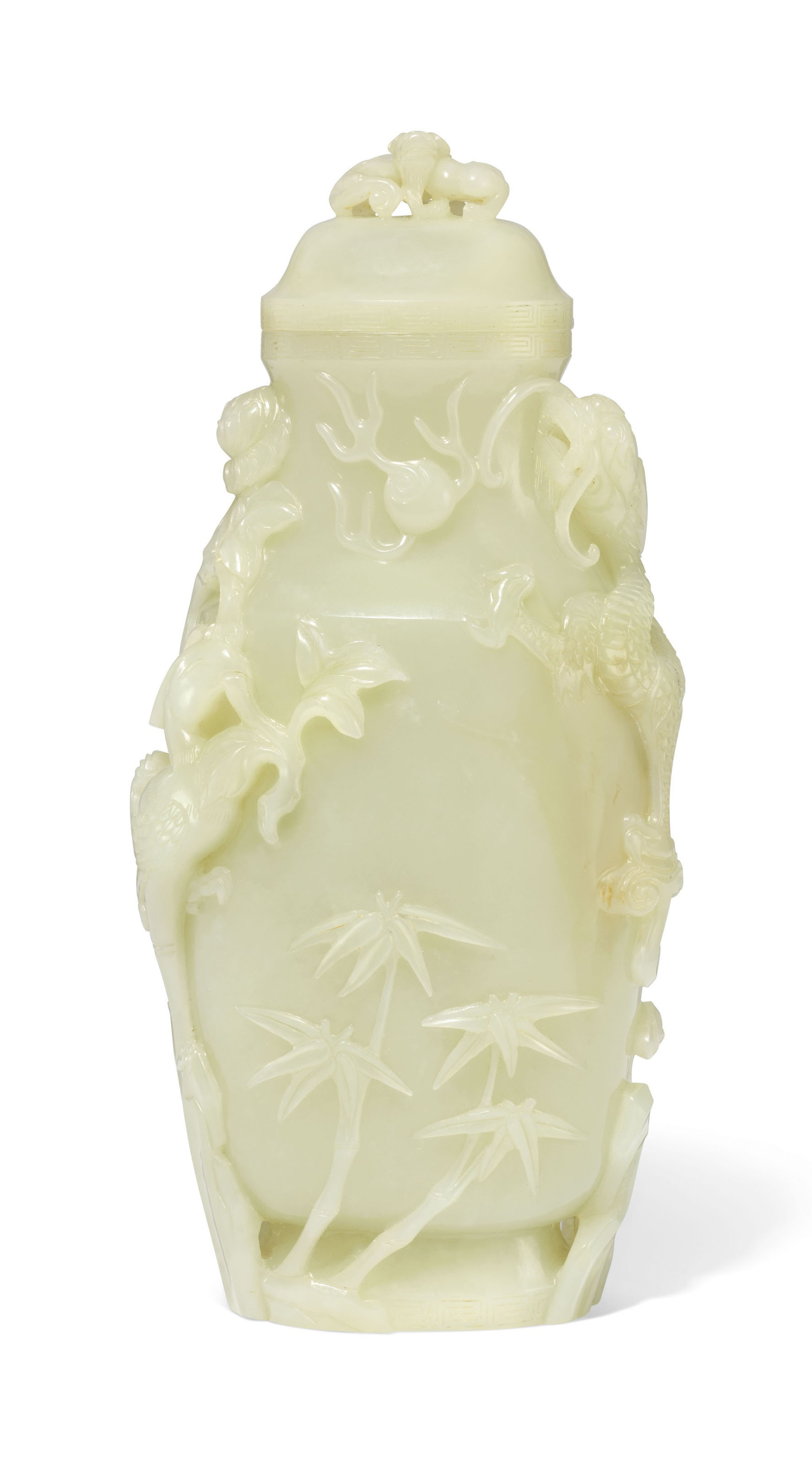 A CARVED AND PIERCED WHITE JADE 'DRAGON AND PHOENIX' VASE AND COVER