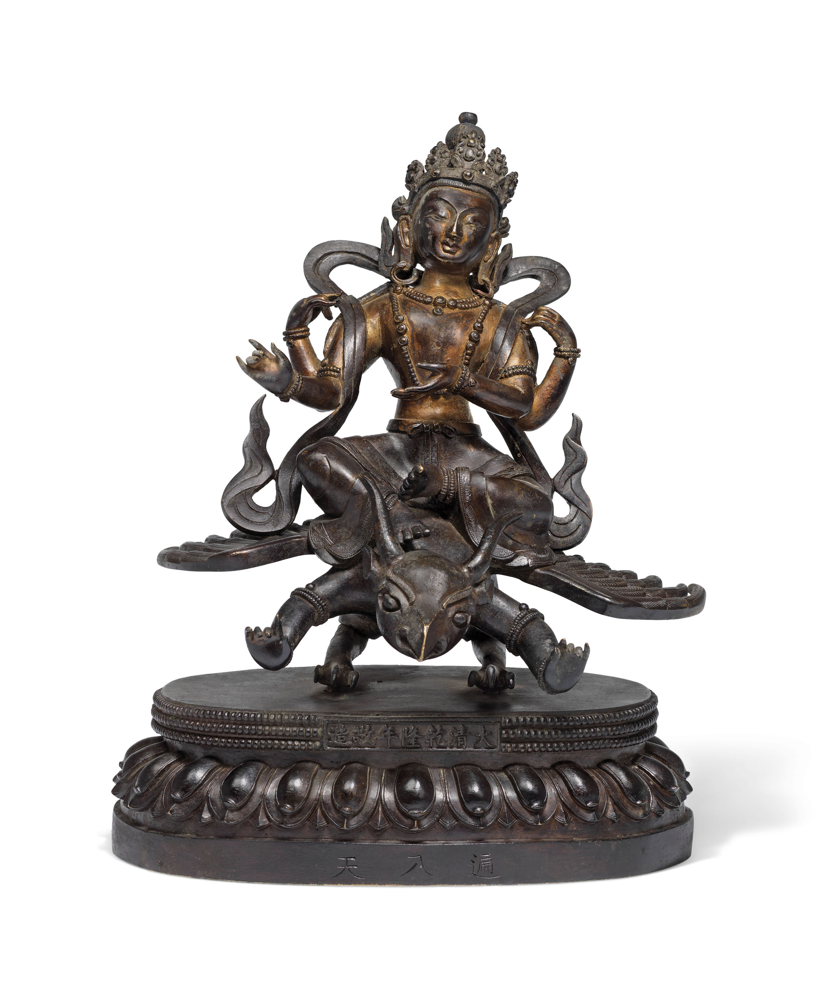 A PARCEL-GILT-BRONZE FIGURE OF VISHNU SEATED ON GARUDA