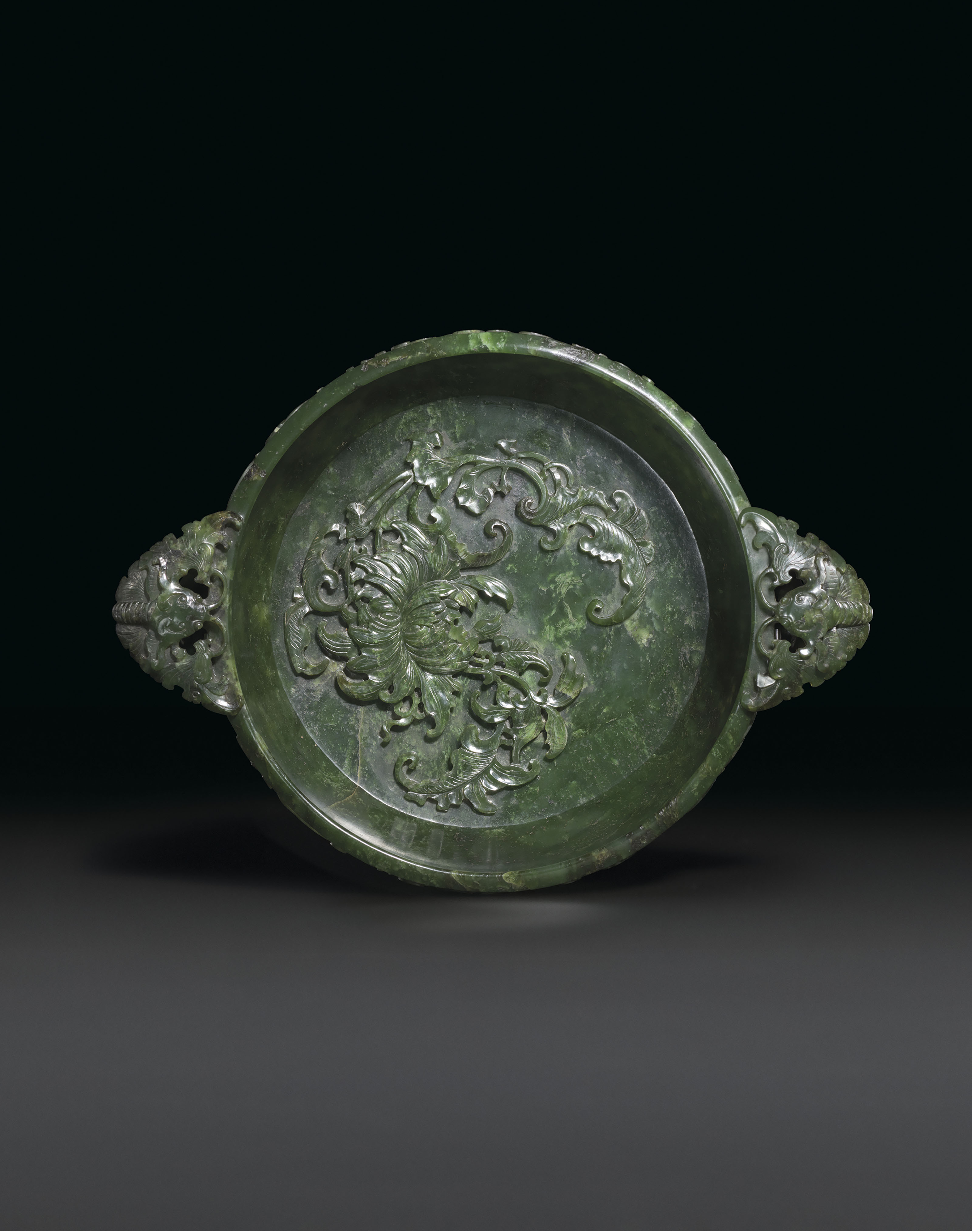 A FINELY CARVED SPINACHGREEN JADE 'MARRIAGE BOWL' , QIANLONG PERIOD