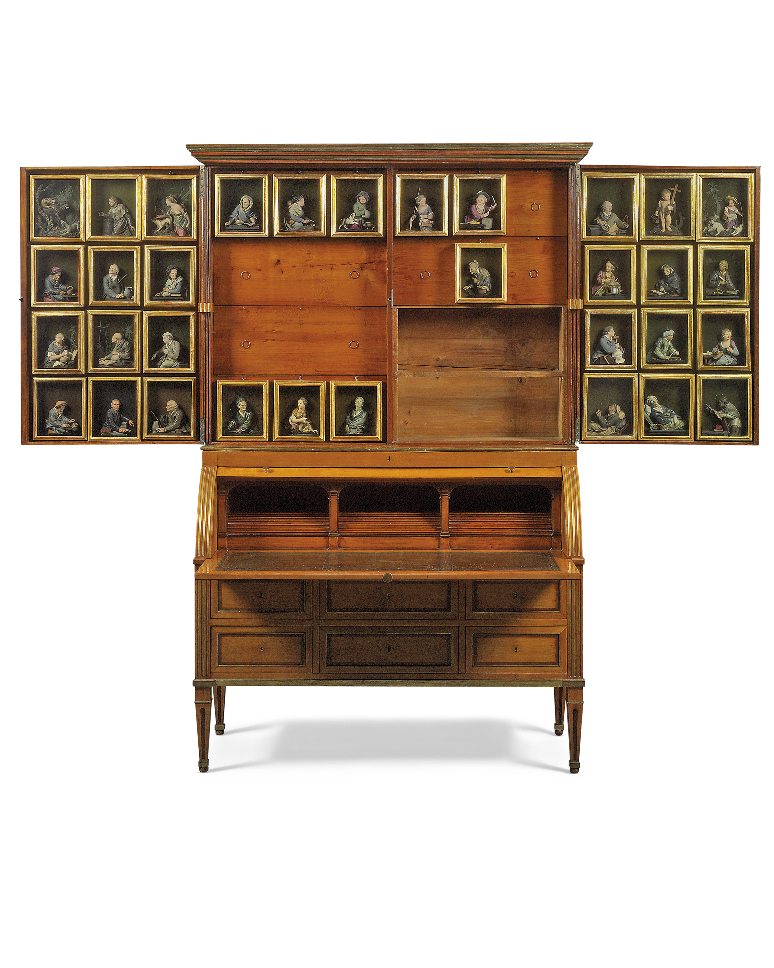 A German Brass Mounted And Satine Crossbanded Cherrywood Cabinet Containing Forty Eight Wax Reliefs The Cabinet Attributed To Theodor Commer The Wax Reliefs By Kaspar Bernhard Hardy Cologne Circa 1795 Bureau A Cylindre