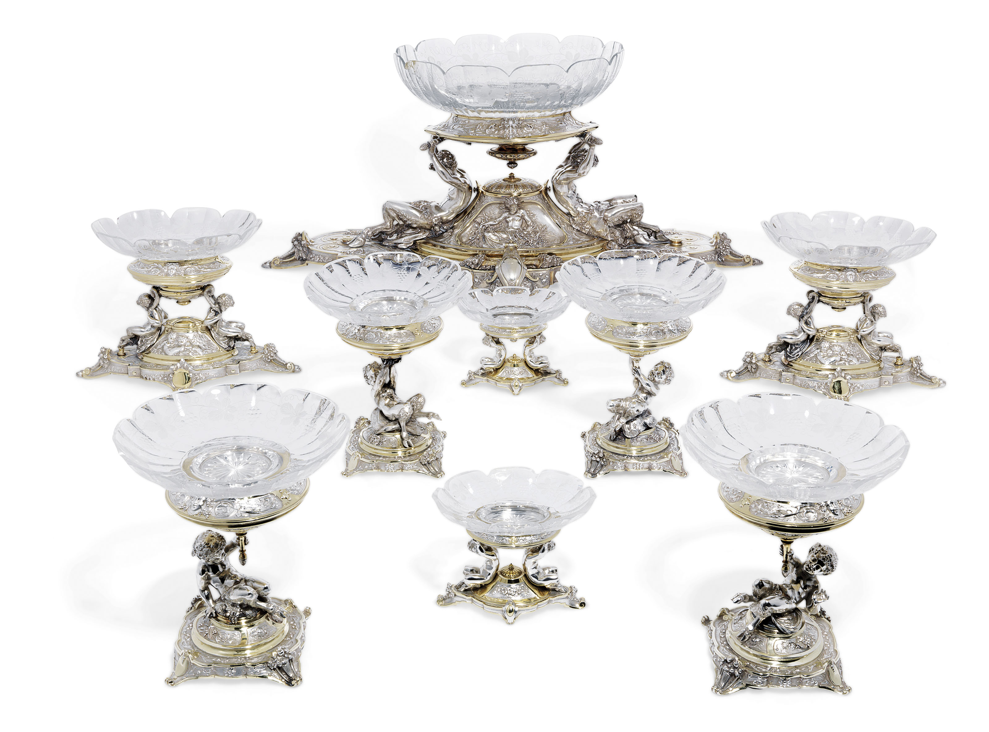 A VICTORIAN PARCELGILT SILVER NINEPIECE TABLE GARNITURE , MARK OF ELKINGTON AND COMPANY