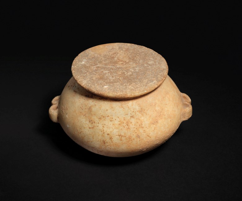 A Cycladic marble lidded spherical pyxis (lidded vase), early Cycladic I-II, circa 3200-2300 BC. 3 in (7.6 cm) high, 4¾ in (12 cm) wide. Sold for £106,250 on 3 July 2019 at Christie's in London