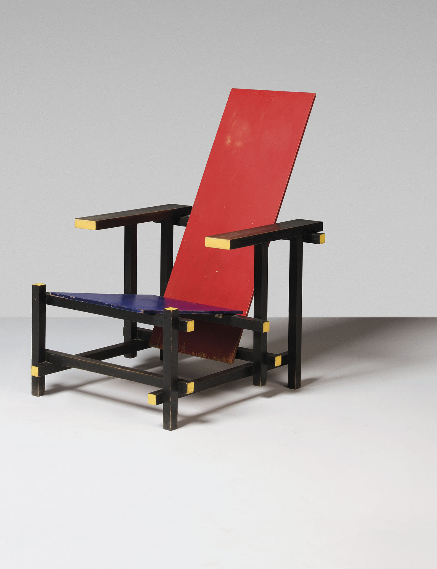 Indulge in Comfort with the Enchanting Red and Blue Armchair: A Symphony of Style and Relaxation