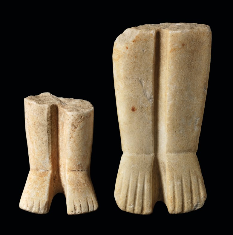 Two Cycladic marble leg fragments, late Spedos variety, early Cycladic II, circa 2500-2400 BC. 5⅞  in (14.8  cm) high  max