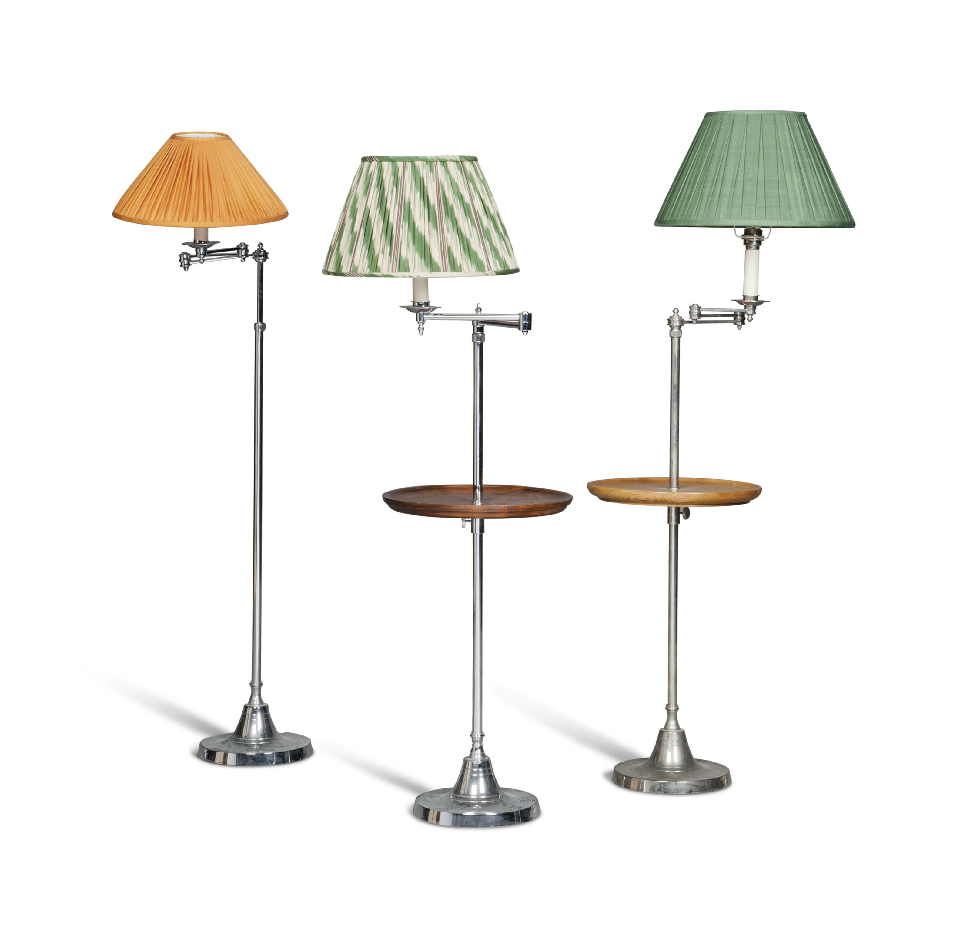 THREE CHROMEPLATED ADJUSTABLE FLOOR STANDING READING LAMPS