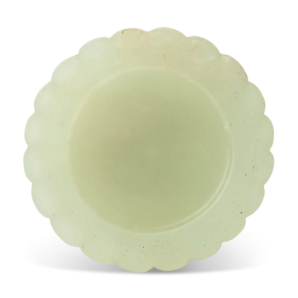 A PALE GREENISHWHITE JADE FLUTED VASE, 18TH19TH CENTURY Christie’s