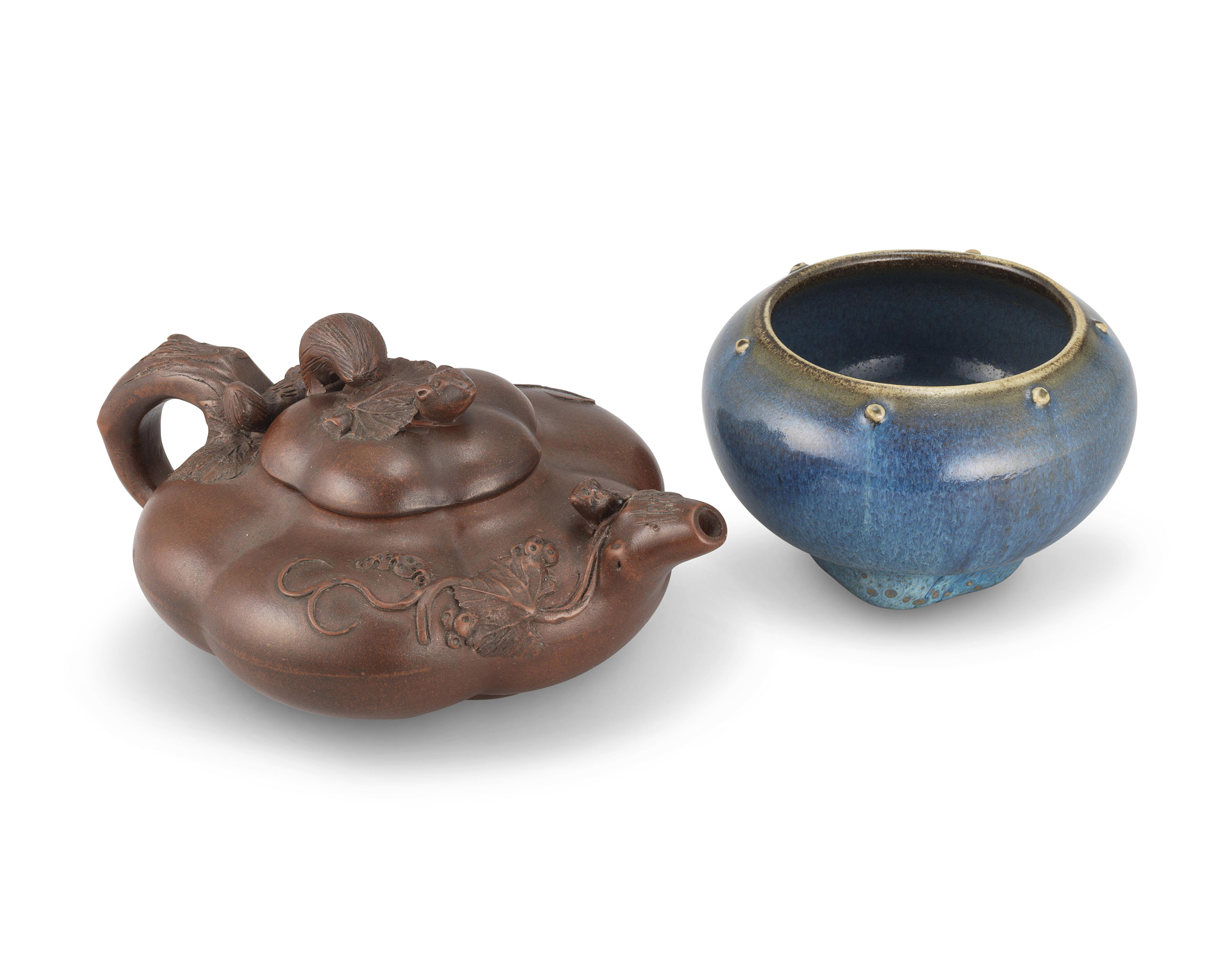 A YIXING TEAPOT AND COVER AND A SHIWAN BLUEGLAZED JAR, 20TH CENTURY