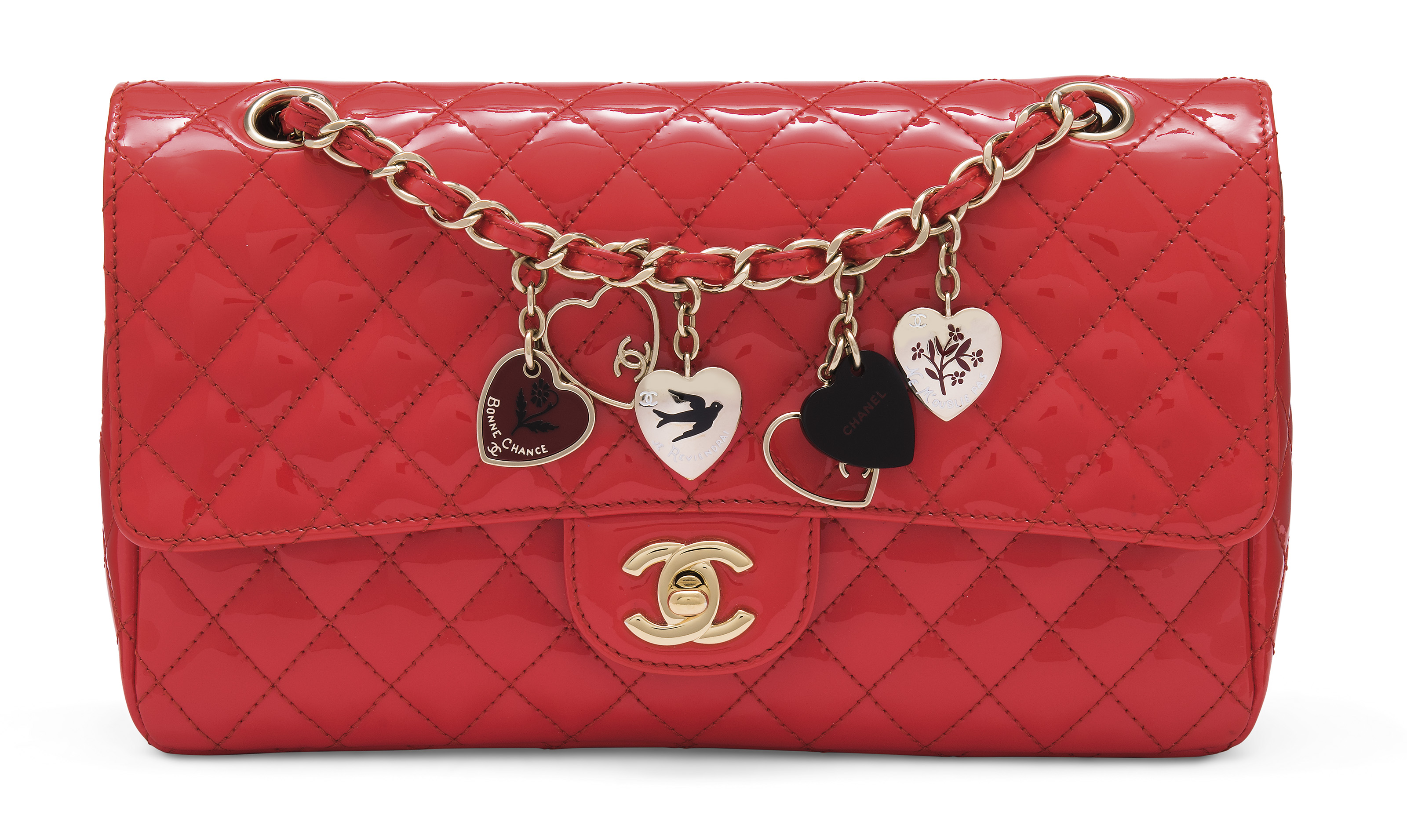 A RED PATENT LEATHER VALENTINE LUCKY CHARMS MEDIUM SINGLE FLAP