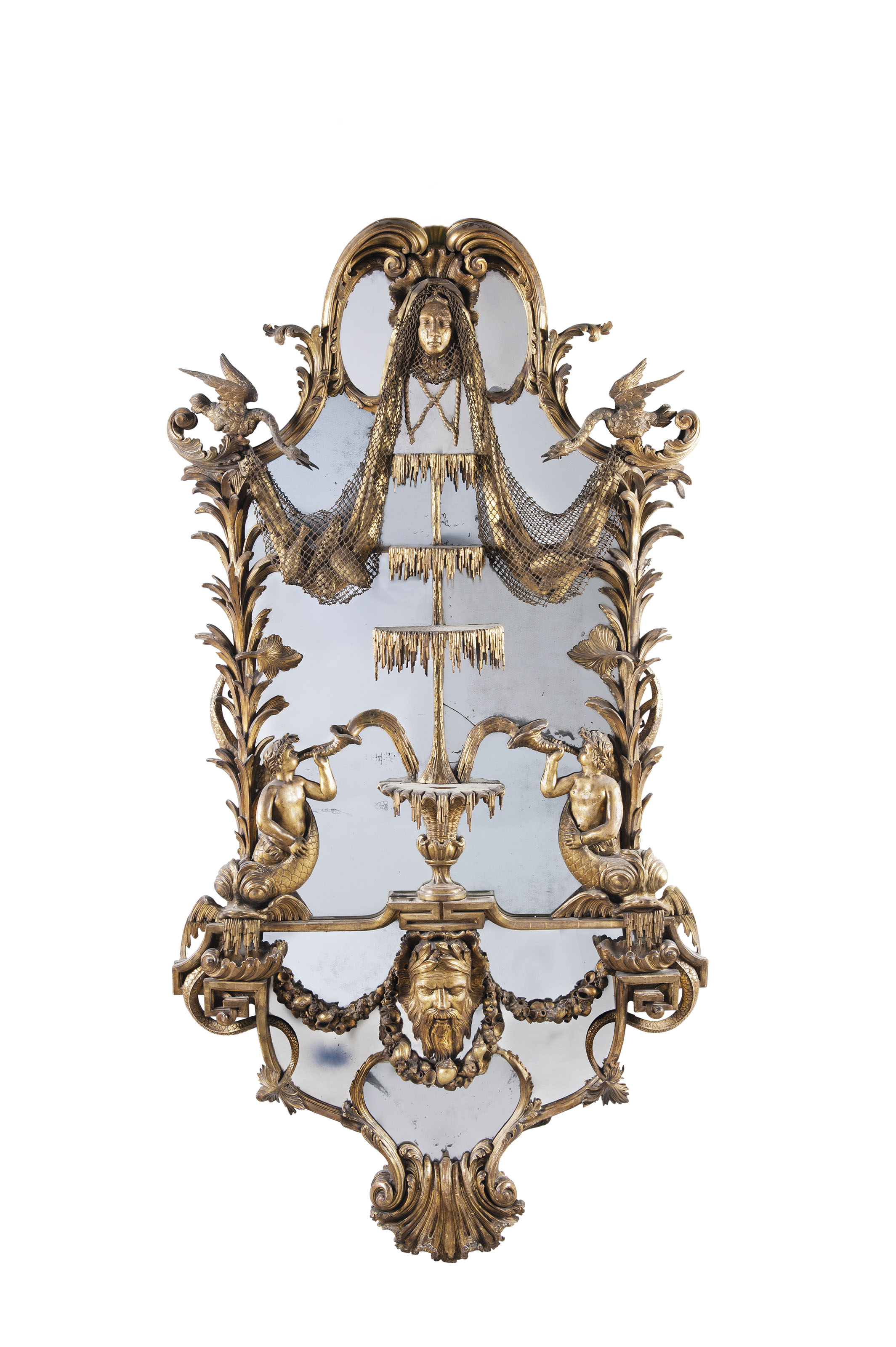 A George II giltwood pier mirror, attributed to Matthias Lock, circa 1750-60. 109 x 51&frac12;  in (277 x 131  cm). Estimate: &pound;150,000-250,000. Offered in The Collection of Drue Heinz Townhouses in London and New York with interiors by John Fowler and Renzo Mongiardino on 4 June 2019 at Christie&rsquo;s in London