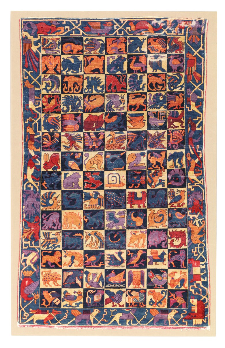 A silk heraldic rug, possibly Kashan, Central Persia, early 20th century. Unmounted 6 ft 4 in x 3 ft 8 in (198 cm x 116 cm). Mounted 6 ft 8 in x 4 ft 3 in (209 cm x 132 cm). Estimate £25,000-30,000. Offered in The Oliver Hoare Collection on 25 October 2019 at Christie’s in London
