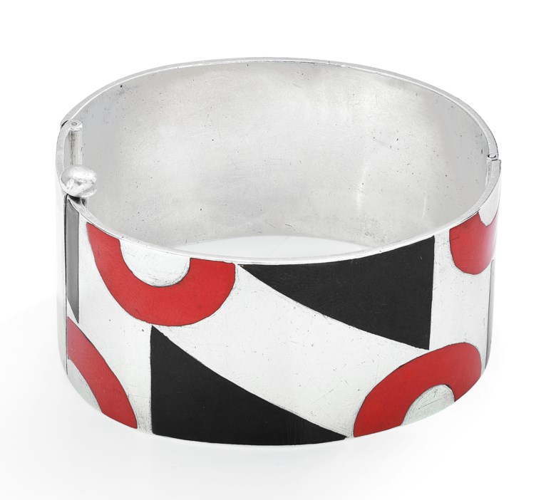 Paul Brandt, Art Deco lacquer cuff bracelet, circa 1928. Red and black lacquer, silver (French marks), inner circumference 15.8 cm, signed Paul Brandt. Sold for CHF 27,500 on 15 May 2019 at Christie’s in Geneva