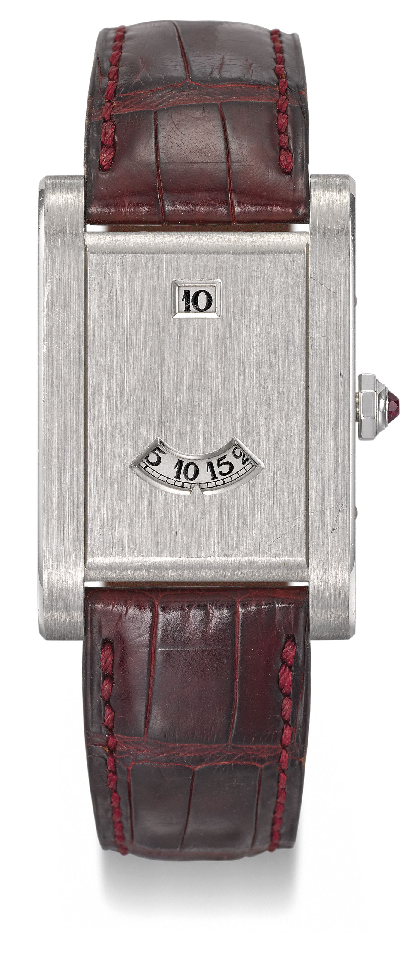 CARTIER. A VERY FINE AND RARE PLATINUM LIMITED EDITION JUMP HOUR WRISTWATCH MADE TO COMMEMORATE THE 150TH ANNIVERSARY OF CARTIER Signed Cartier Paris Tank a Guichet No. 111 150 Case No. A114470 Circa