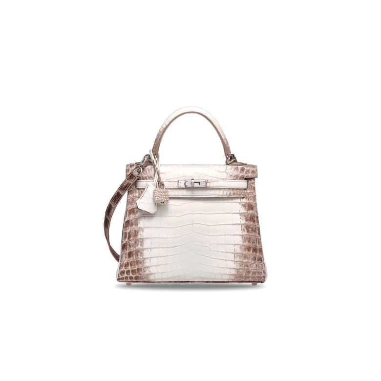 A rare, matte white Himalaya Niloticus Crocodile Retourné Kelly 25 with palladium hardware, Hermès, 2019. 25 w x 18 h x 9 d cm. Sold for HK$1,875,000 on 25 November 2019 at Christie’s in Hong Kong