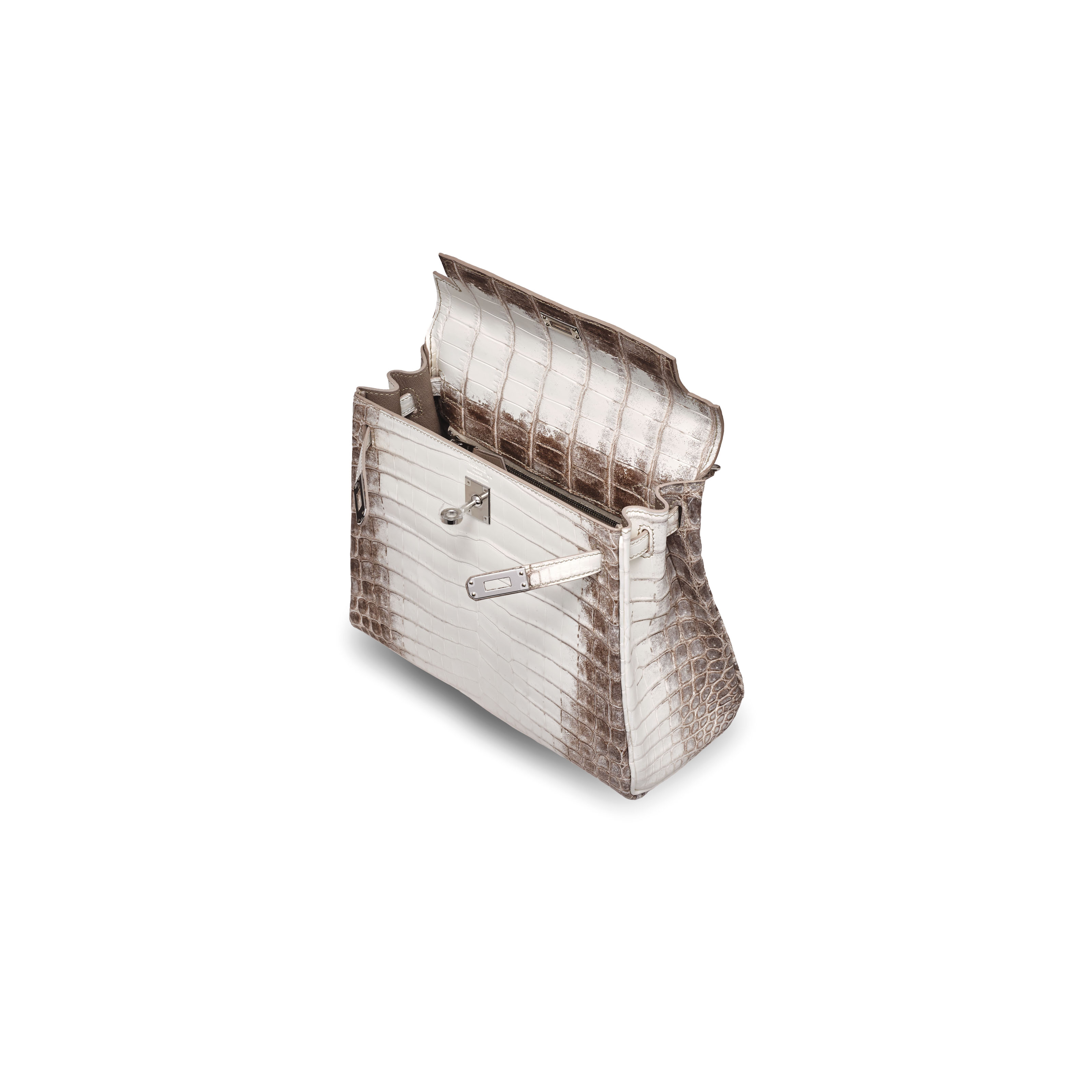 A Rare Matte White Himalaya Niloticus Crocodile Retourne Kelly 25 With Palladium Hardware Hermes 2019 21st Century Bags Christie S