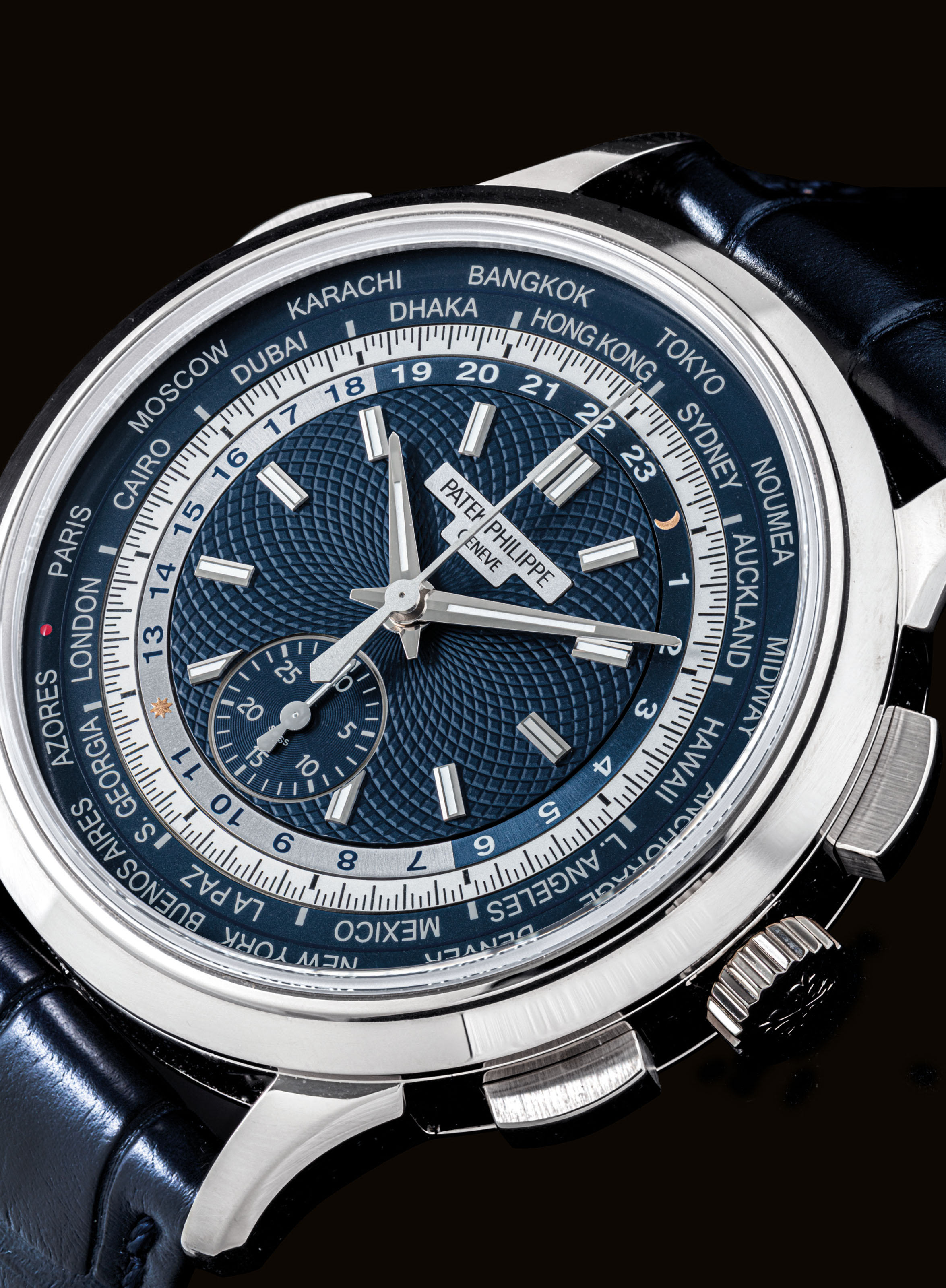 Patek Philippe A Fine And Rare 18k White Gold Automatic Flyback Chronograph Wristwatch With Worldtime Display