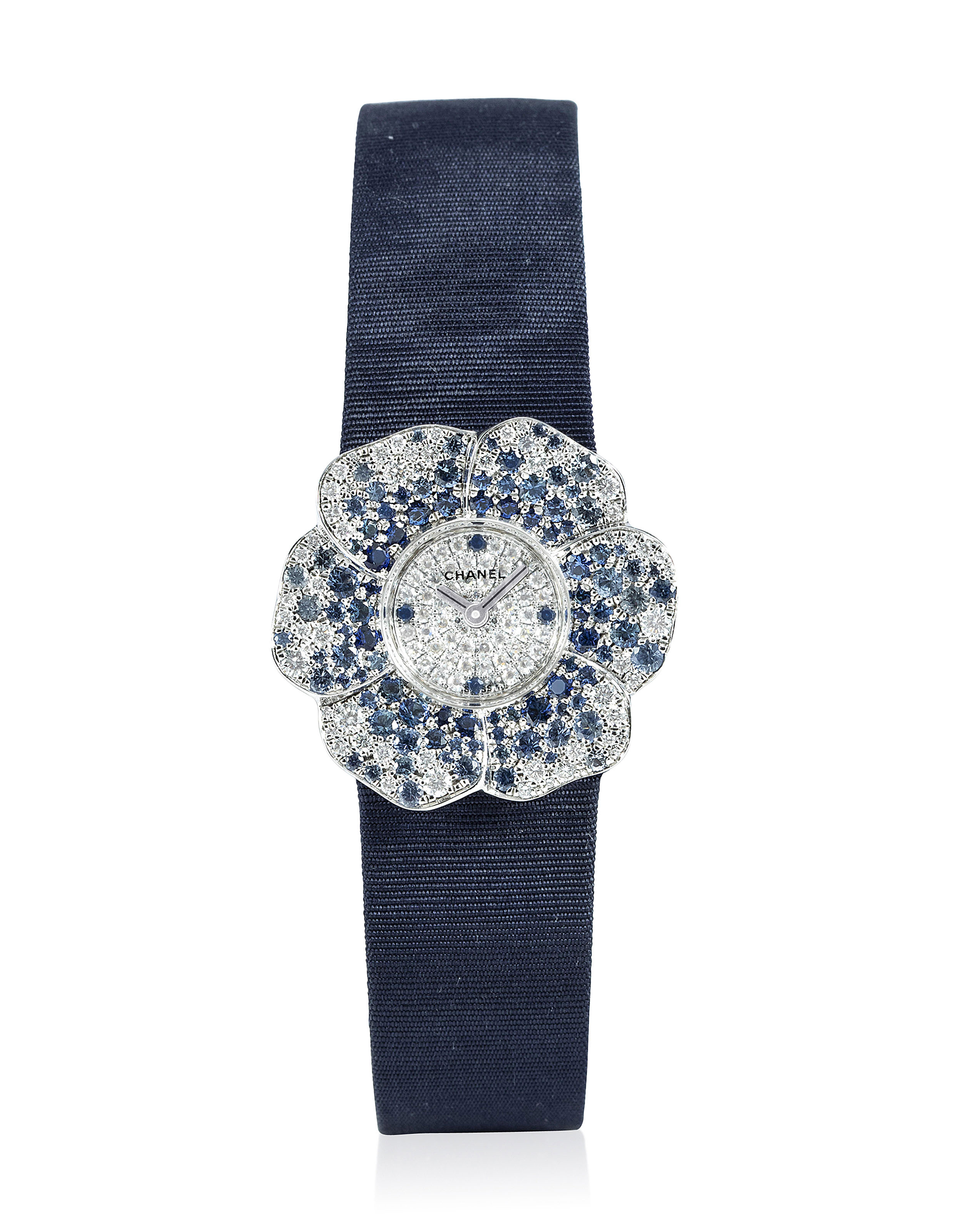 CHANEL, LADY'S WHITE GOLD CAMELLIA WITH DIAMONDS AND SAPPHIRES