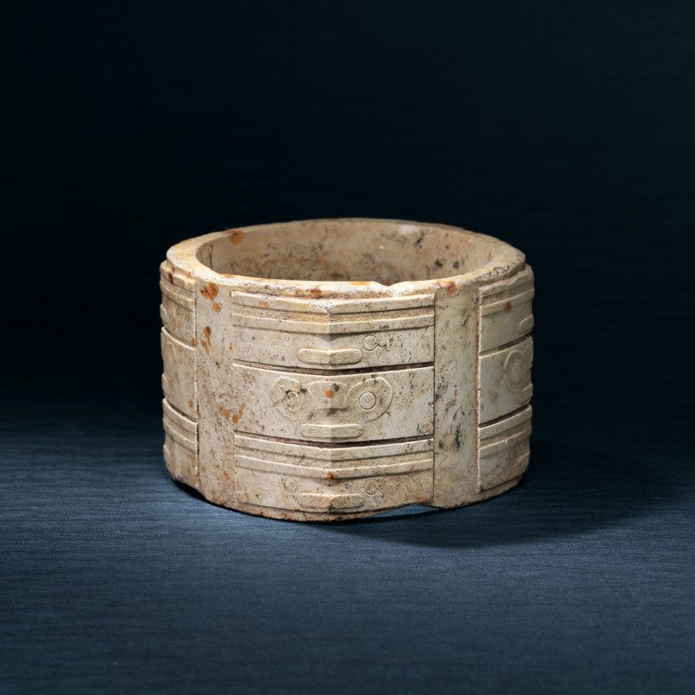 An extremely rare three-tiered jade cong from the Liangzhu Culture (c. 3300-2300 BC). 7.8 cm (3 116 in) high. Sold for HK$31,325,000 on 27 November 2019 at Christie’s in Hong Kong