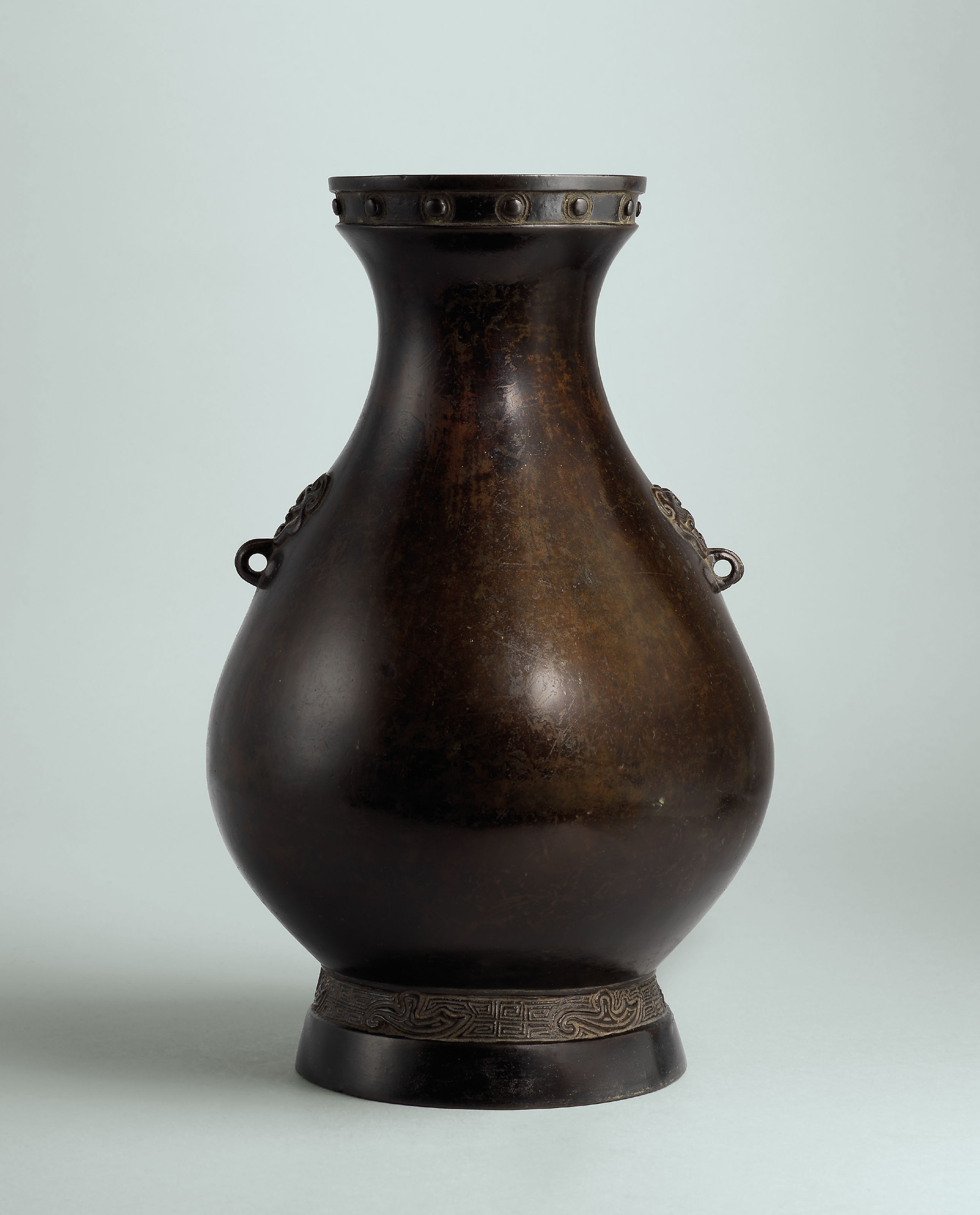 A BRONZE BEASTHANDLED VASE,HU , YUANMING DYNASTY (12791644) Christie's