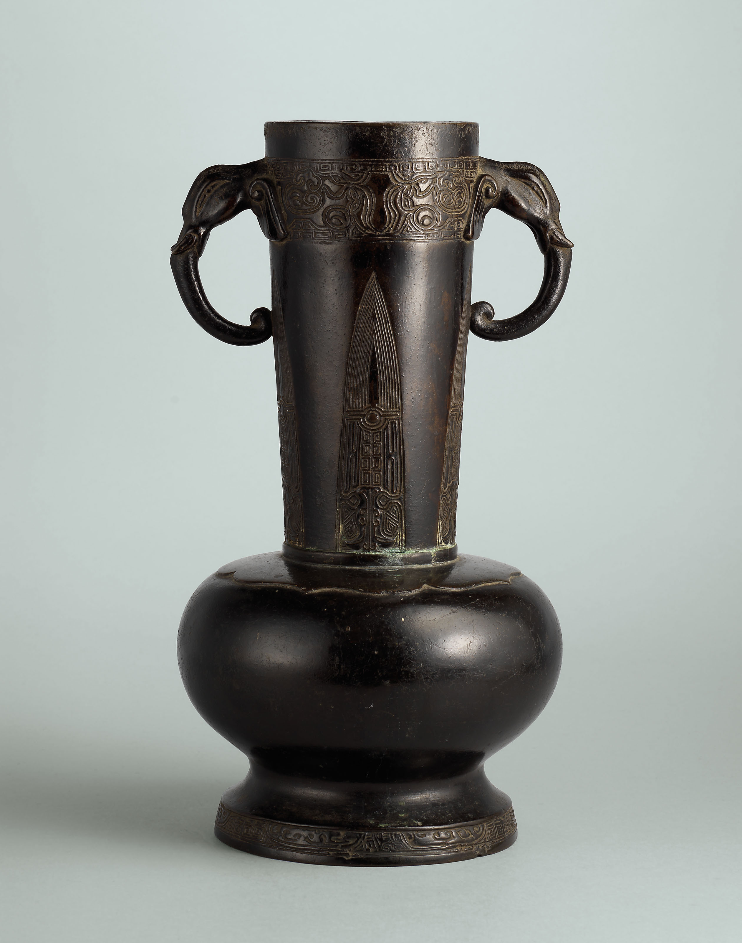A BRONZE ELEPHANTHANDLED BOTTLE VASE , YUANMING DYNASTY (12791644