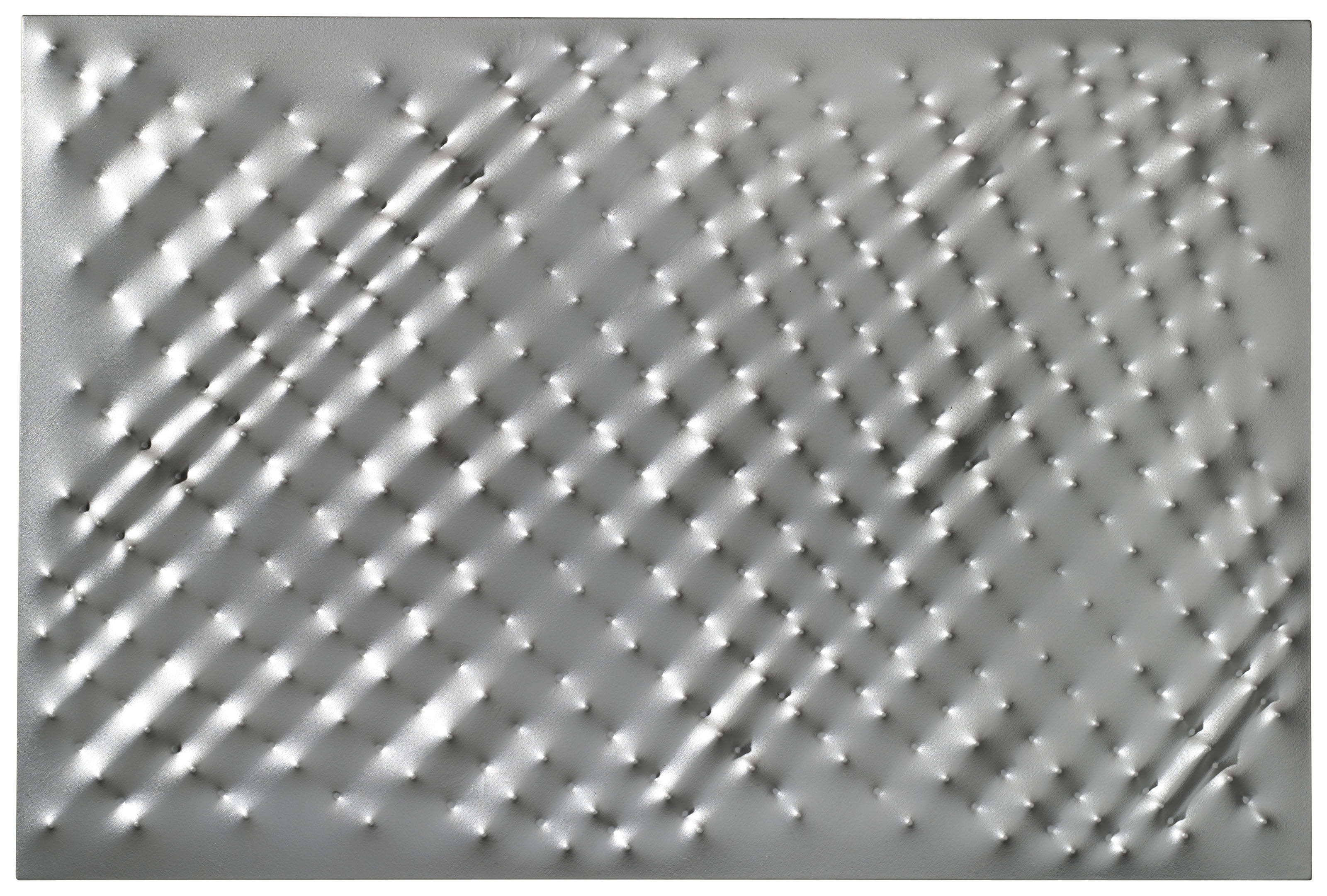 Enrico Castellani (1930-2017), Superficie alluminio, 1995. 80 x 120 cm. Estimate: &euro;300,000-500,000. This lot is offered in Thinking Italian Milan on 3-4 April 2019 at Christie&rsquo;s in Milan